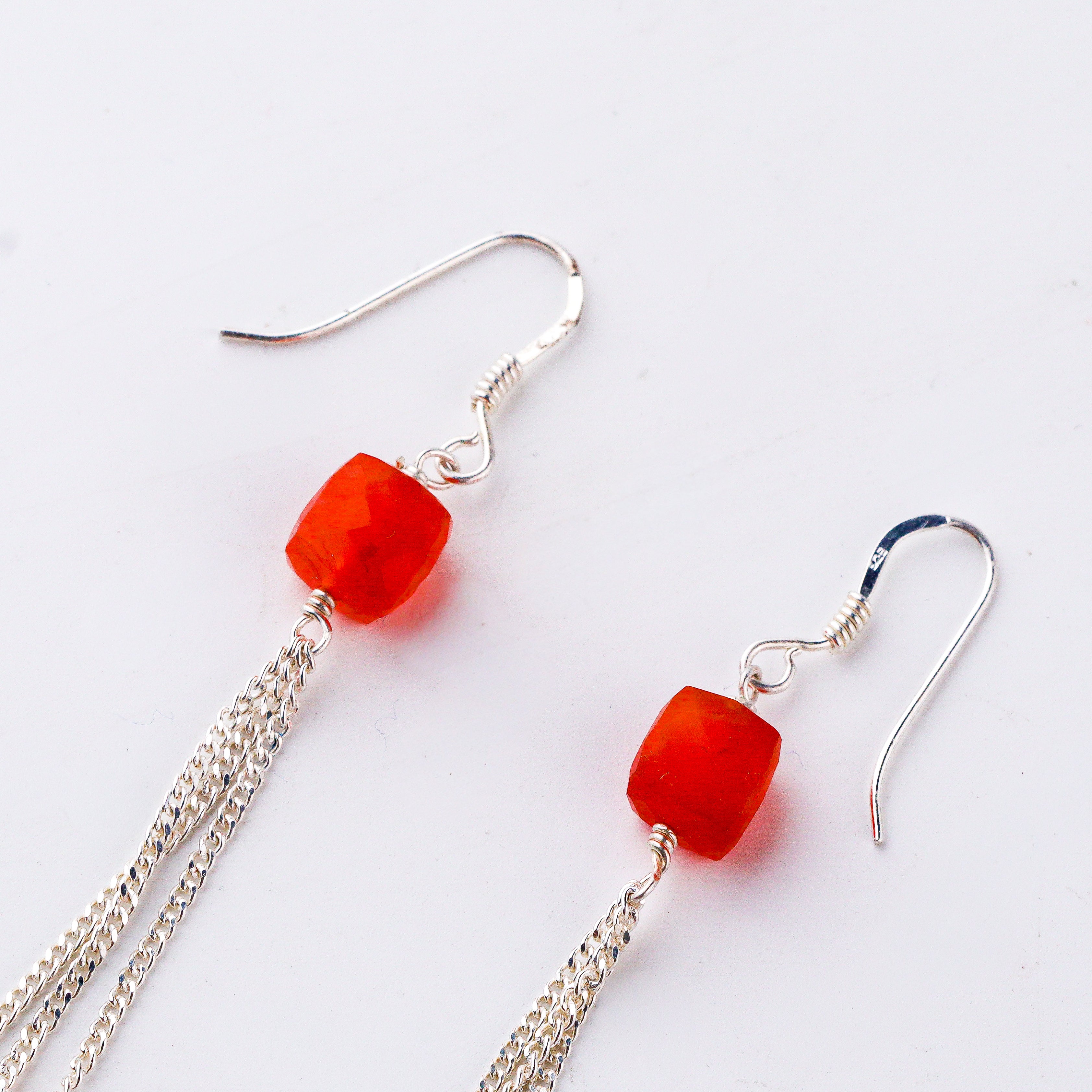 Handcrafted silver earrings with natural carnelian polished finish