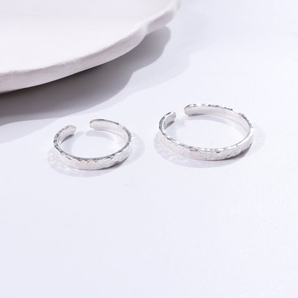 Hammered silver couple rings in minimalist design
