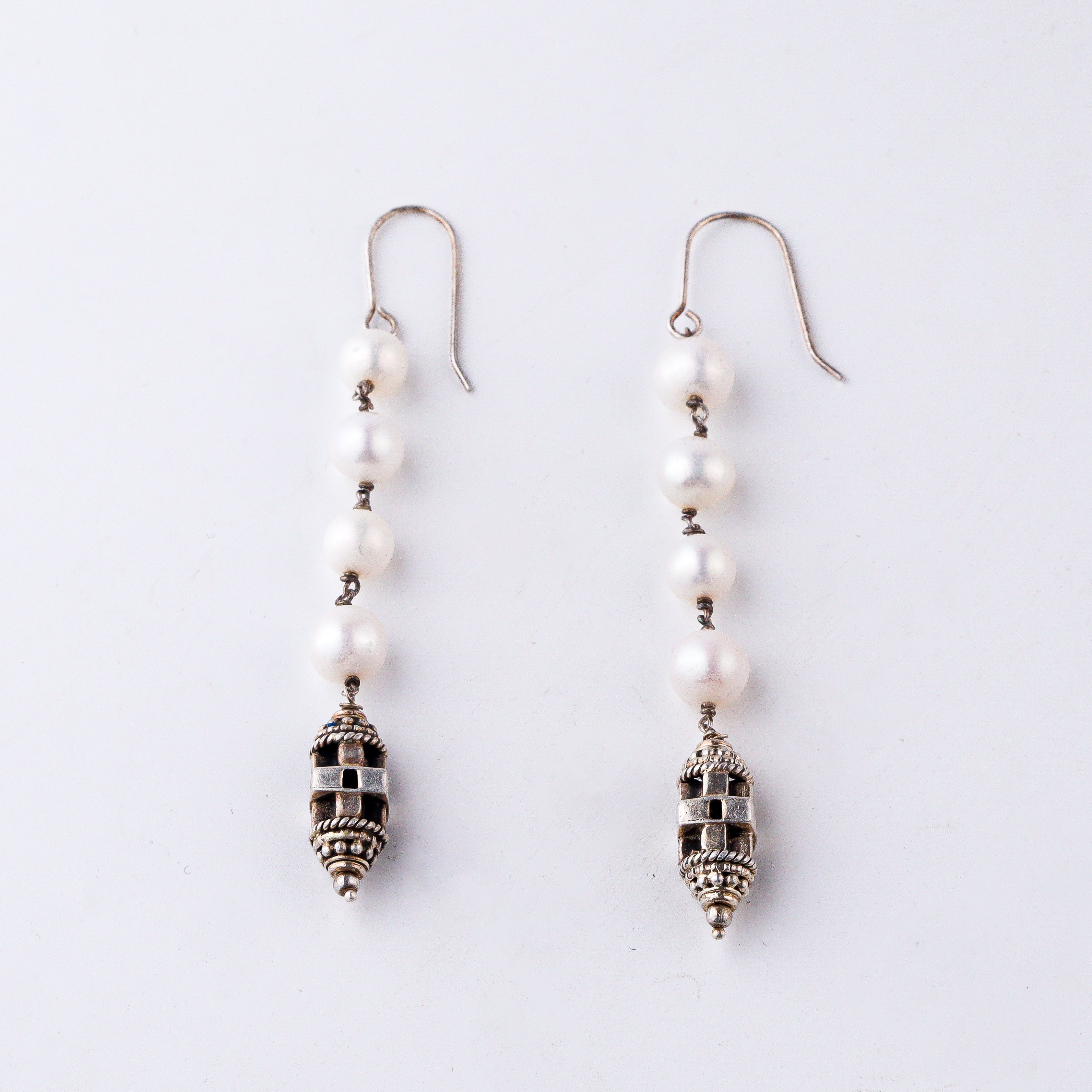 Silver pendant earrings with carved bead in 92.5 sterling silver