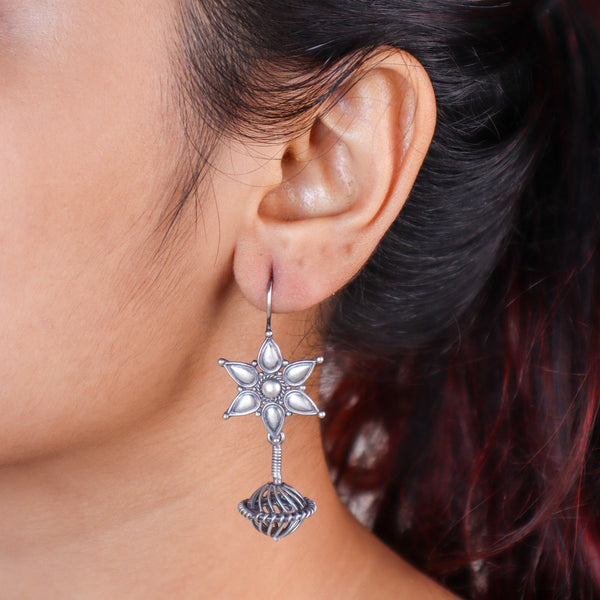 Oxidized Flower Spring Dome Earrings front view in 92.5 silver