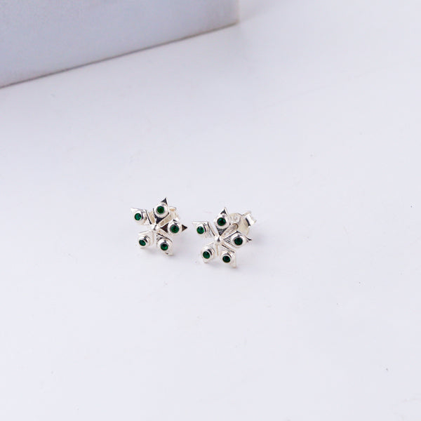 Handcrafted silver Nakshatra studs polished finish