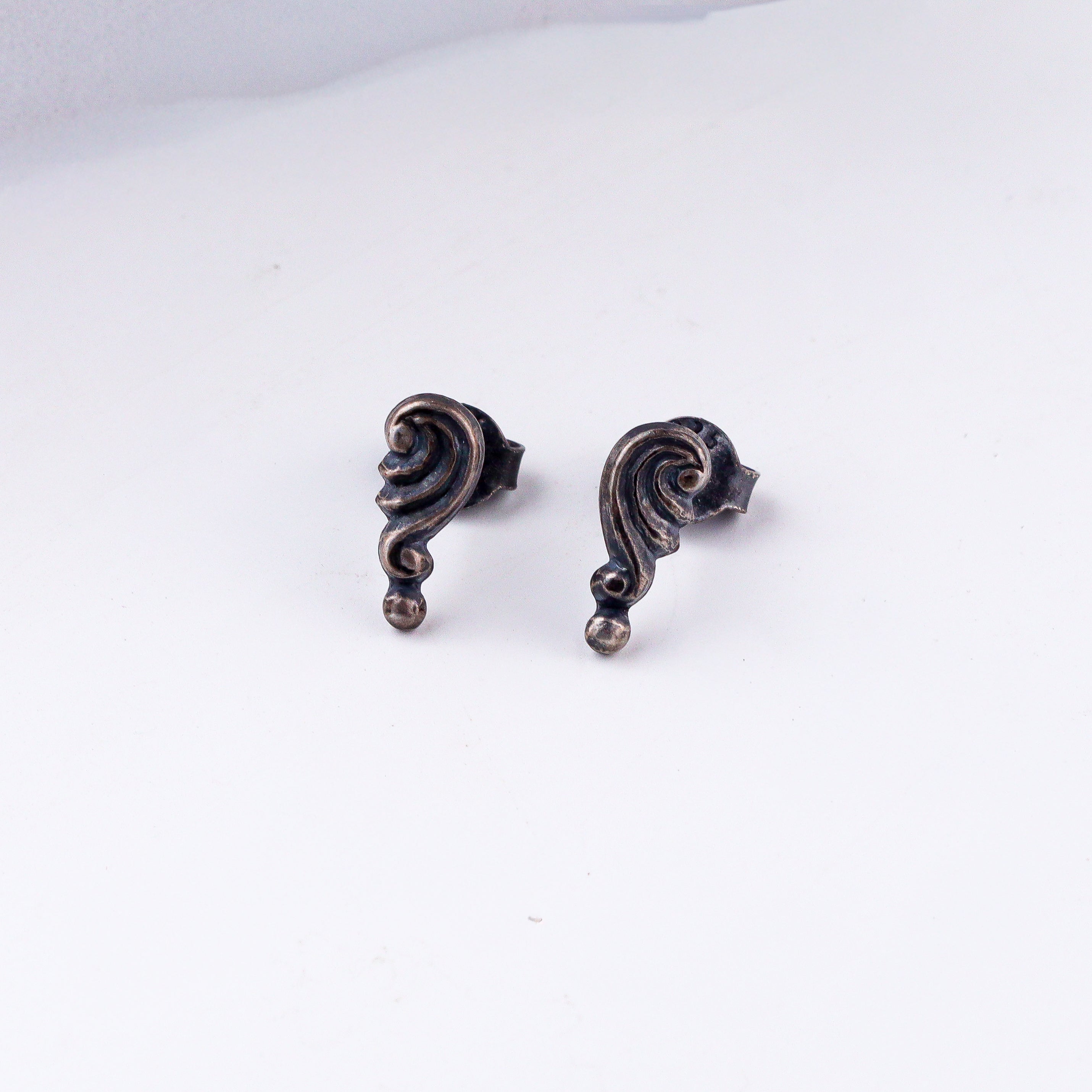 Shell studs in 92.5 sterling silver with oxidized finish