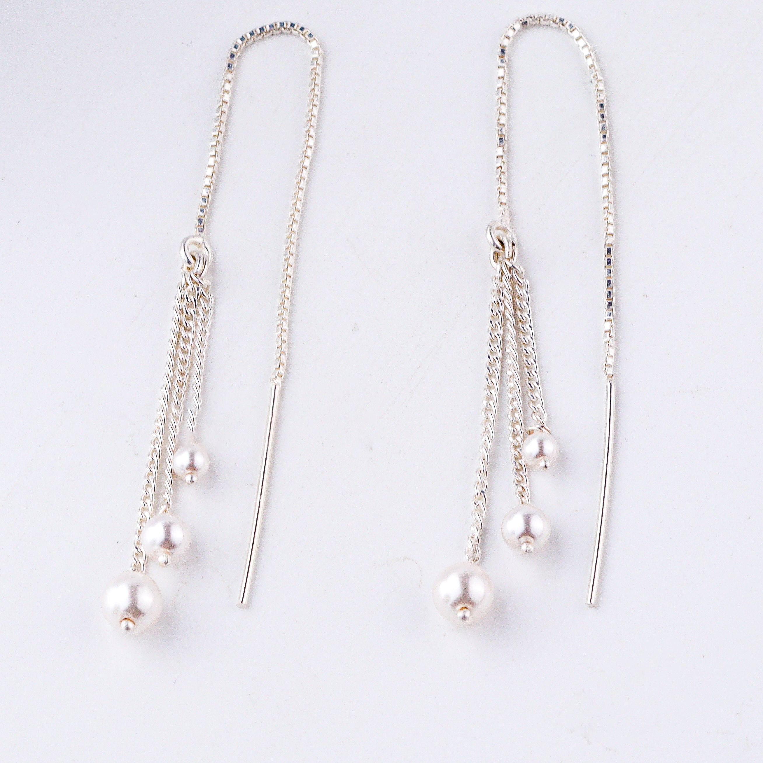 silver threader earrings with three pearls