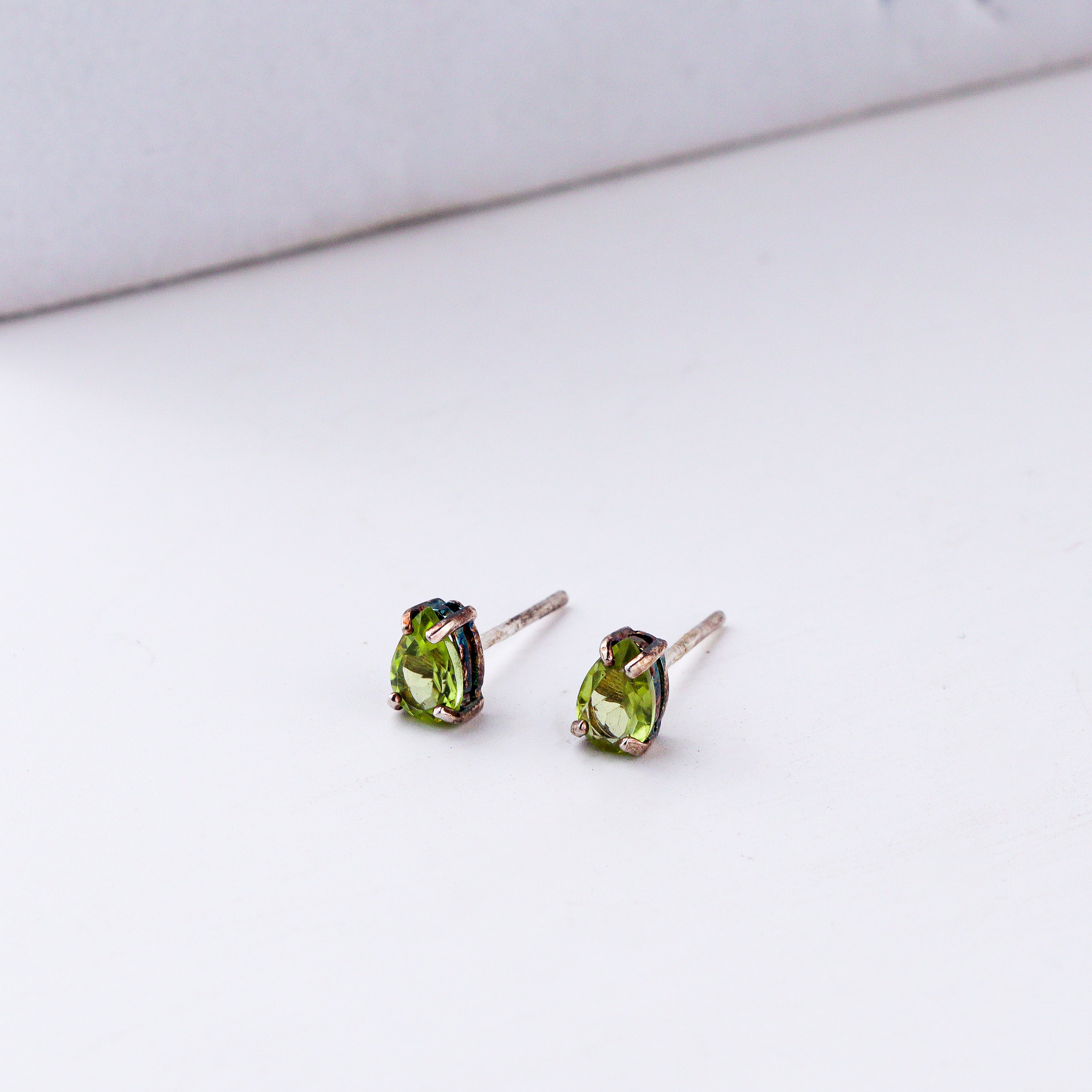 Silver studs with peridot in 92.5 sterling silver