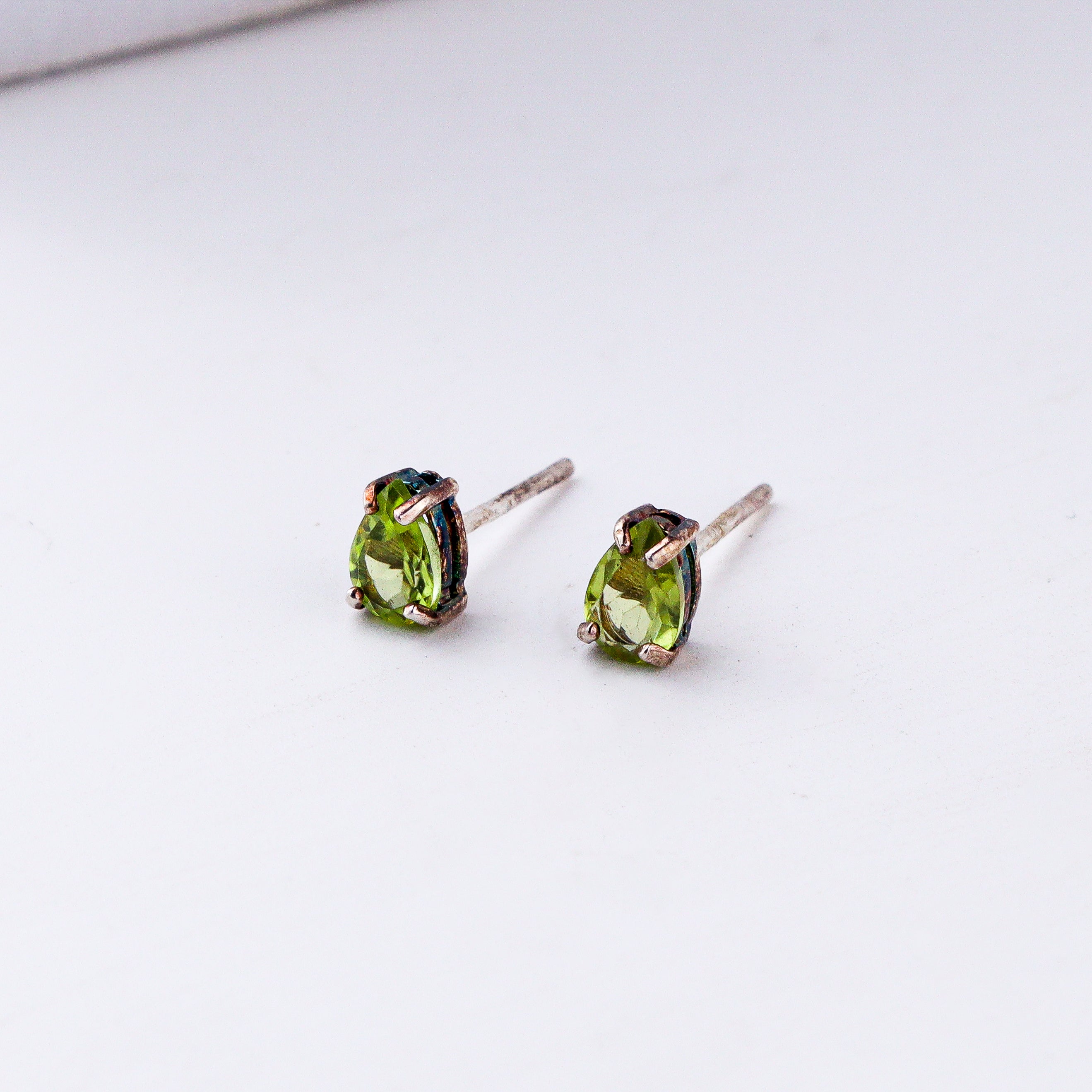 Handcrafted silver peridot studs polished finish