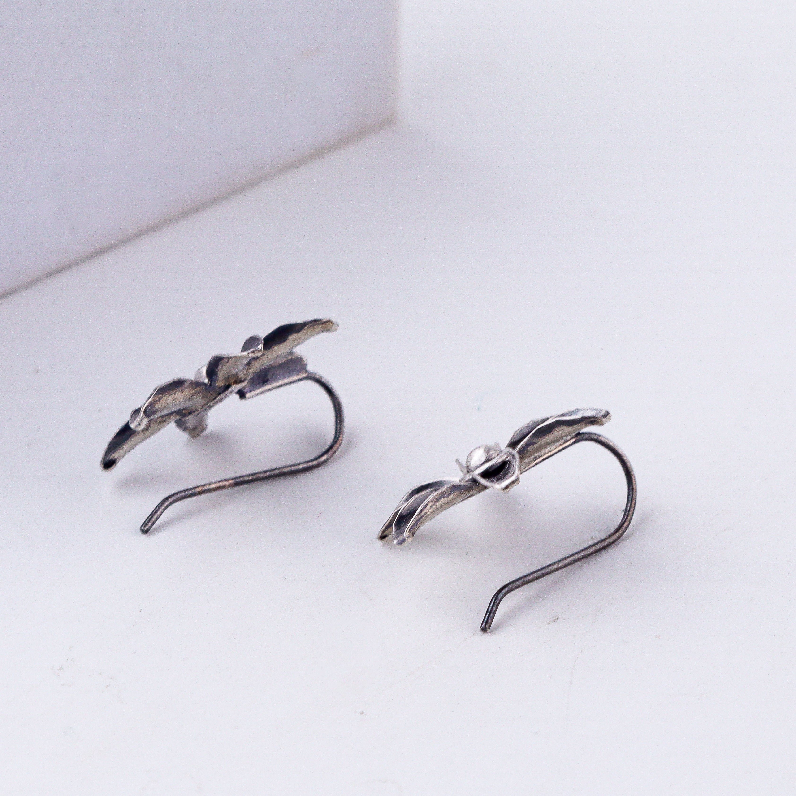 styling floral silver earrings with ethnic outfit