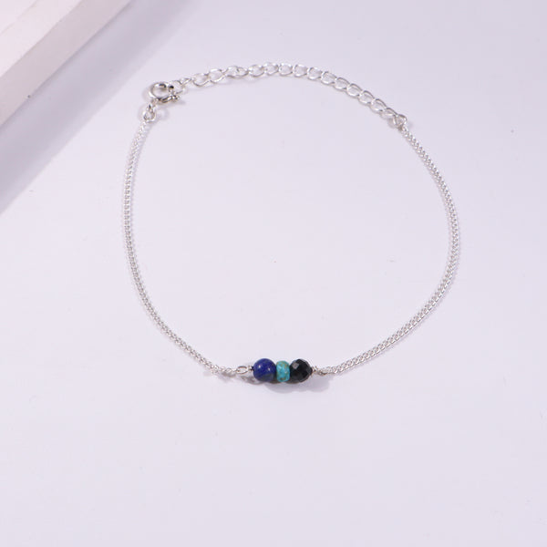 Silver chain bracelet with colorful beads