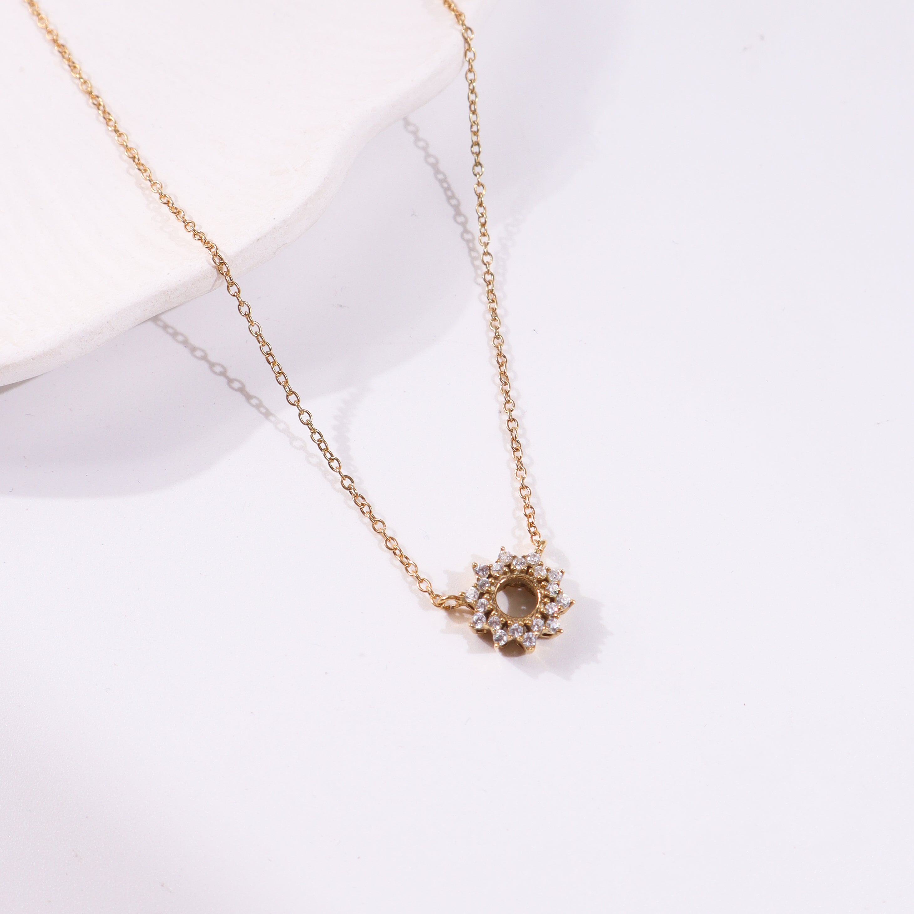 Gold chain necklace with crystal pendant