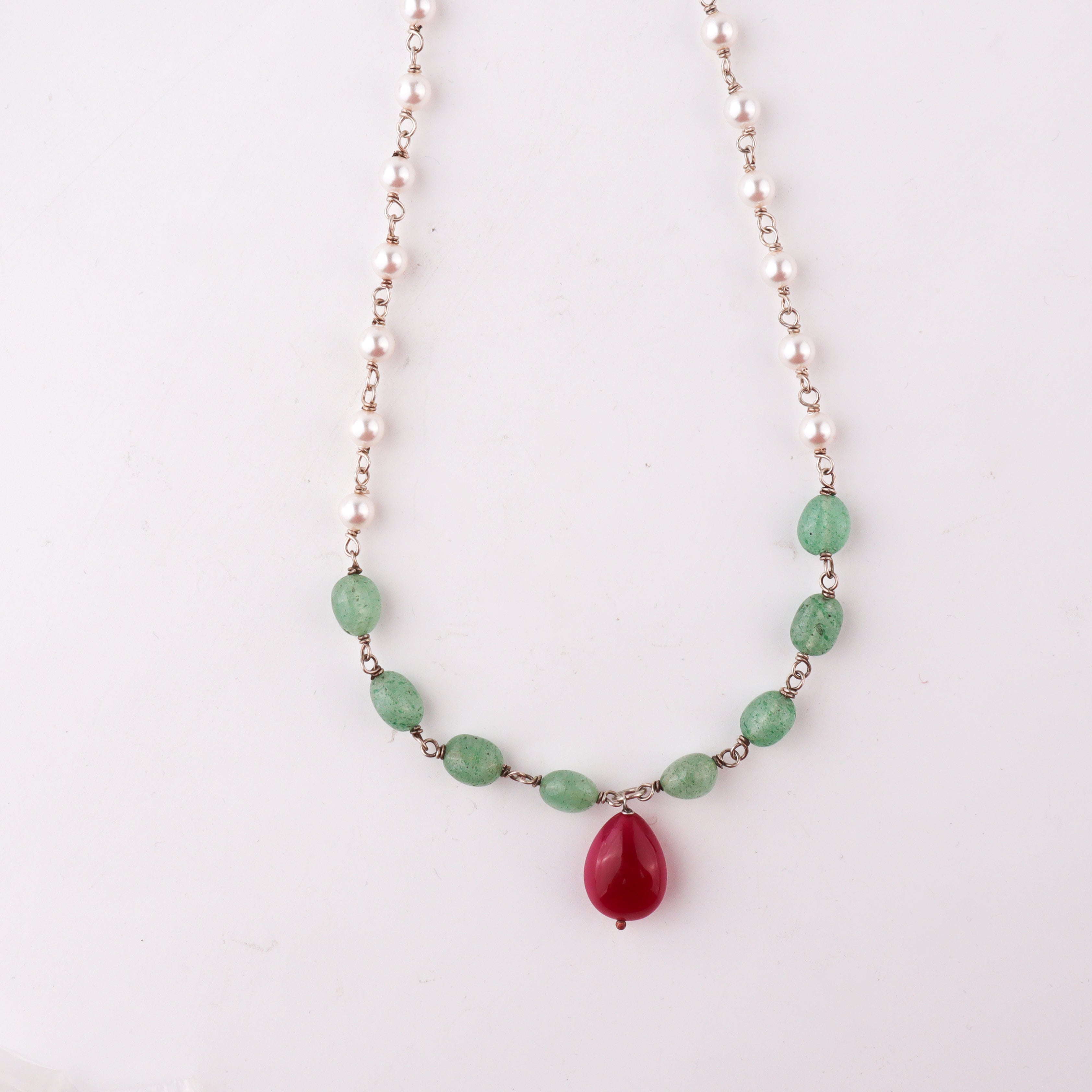 Handcrafted silver pearl ganthan necklace with ruby and green jade polished finish