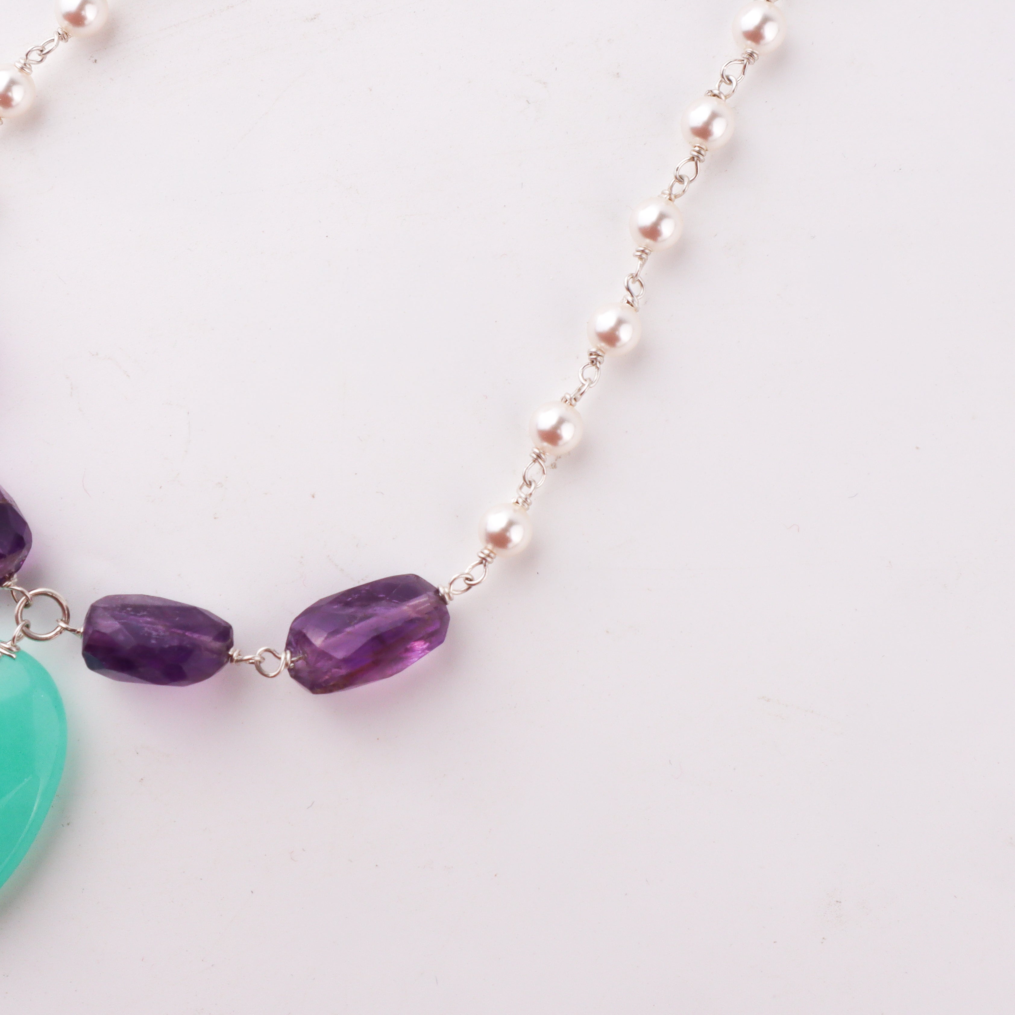 Handcrafted silver pearl ganthan necklace with amethyst and apatite polished finish