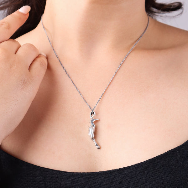 Silver Hornbill pendant on neck