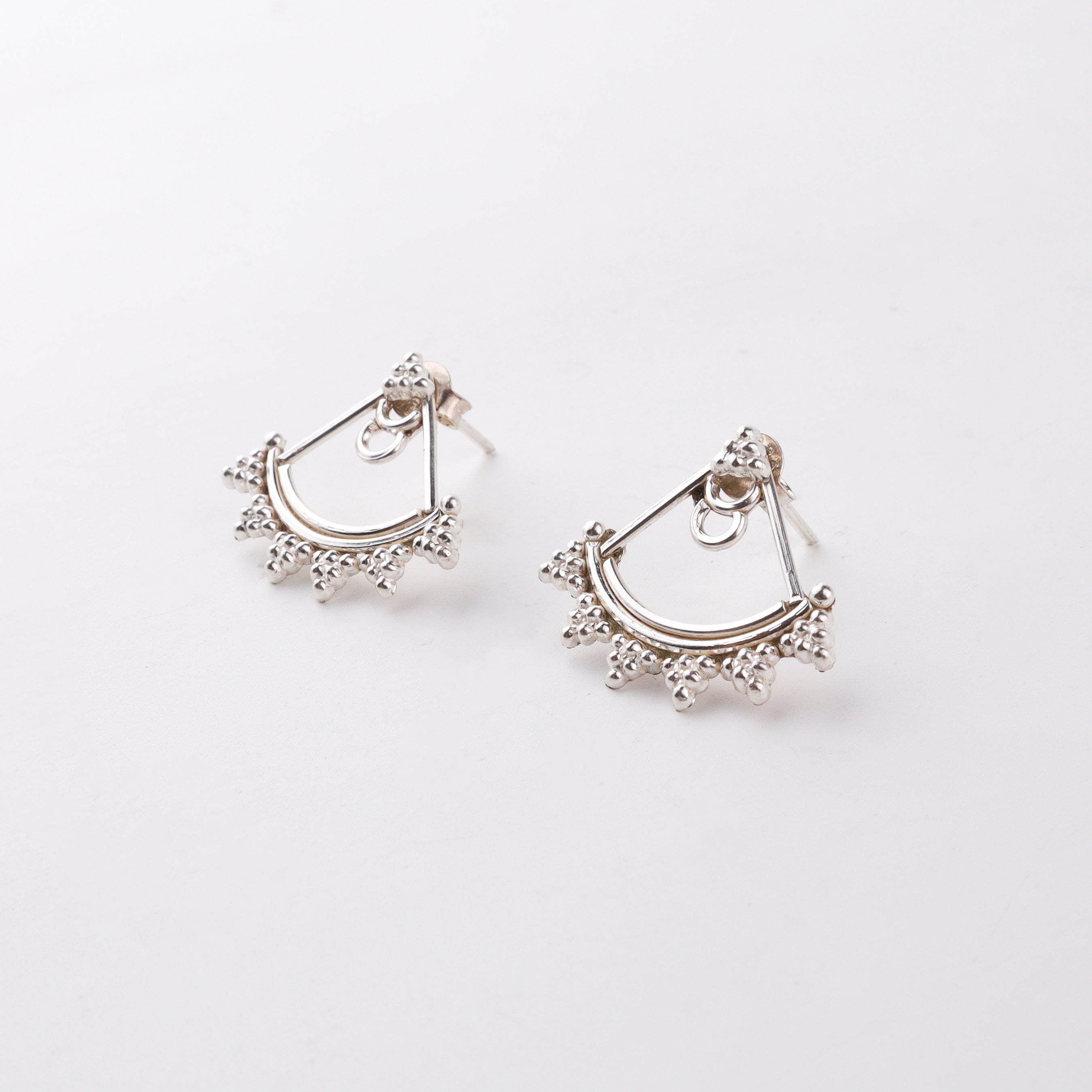 styling oxidized silver jacket earrings with fusion outfit