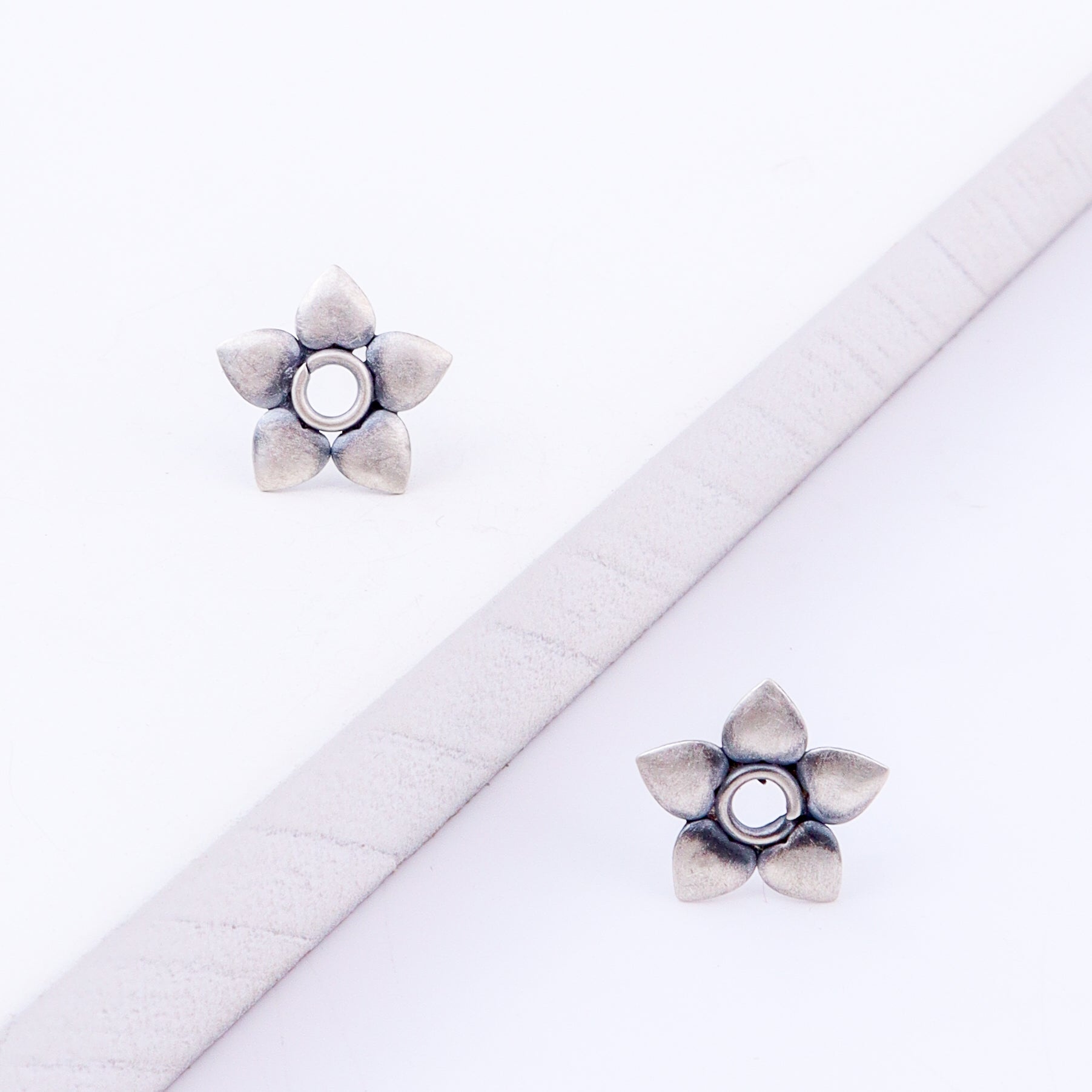 Silver Flower Motif Studs