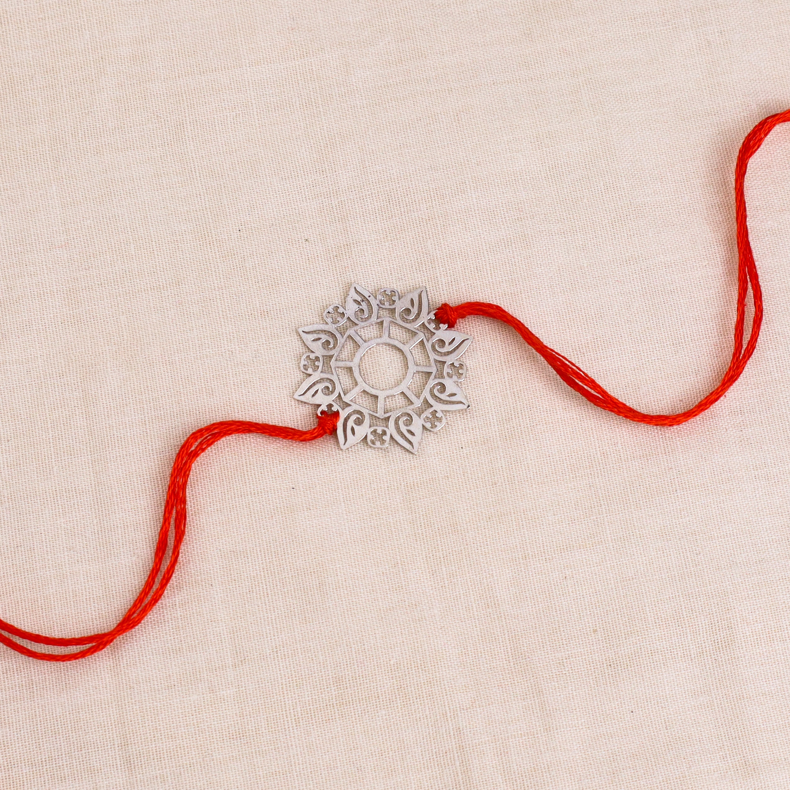 Silver Laser Cut Abstract Rakhi