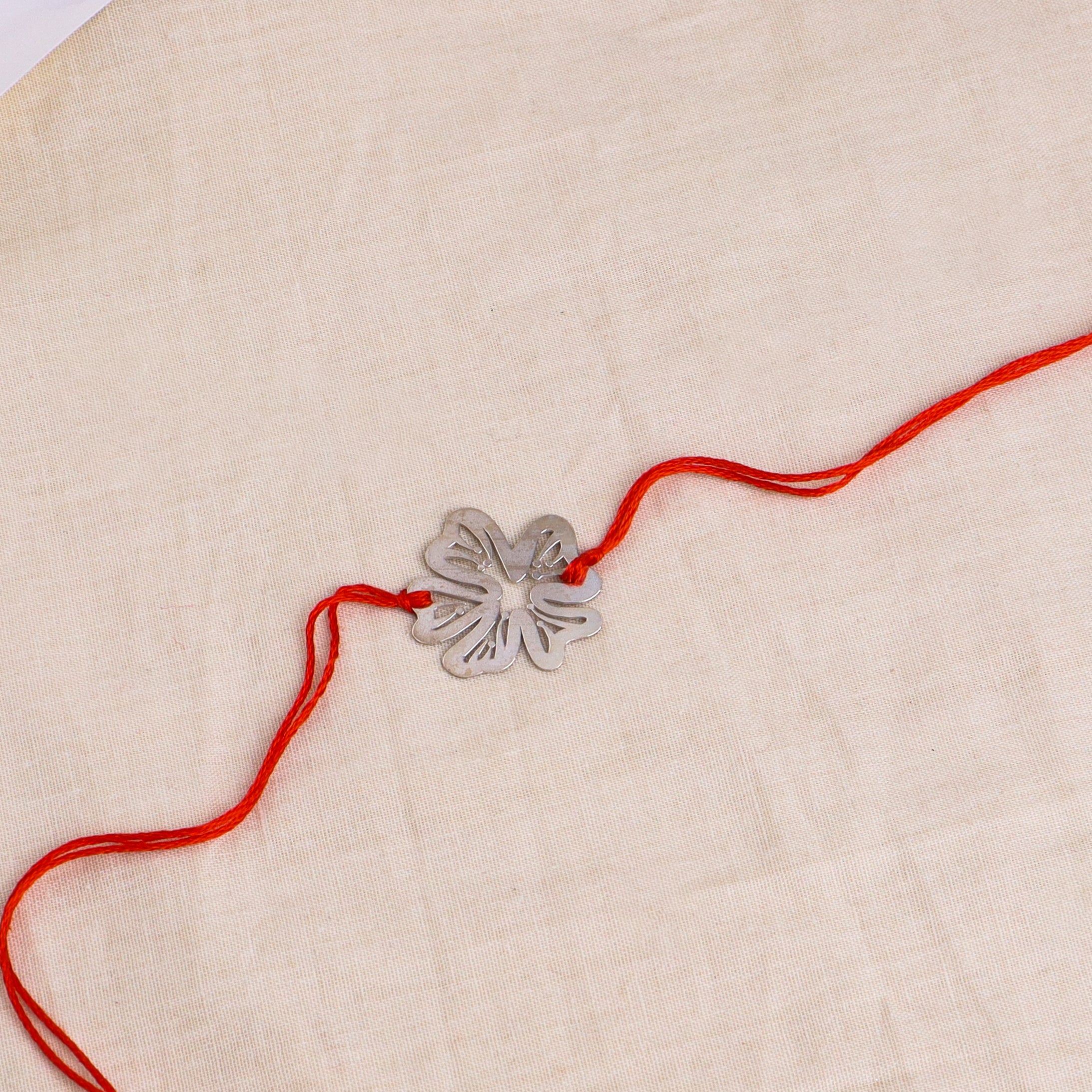 Silver Laser Cut Gulmohar Rakhi