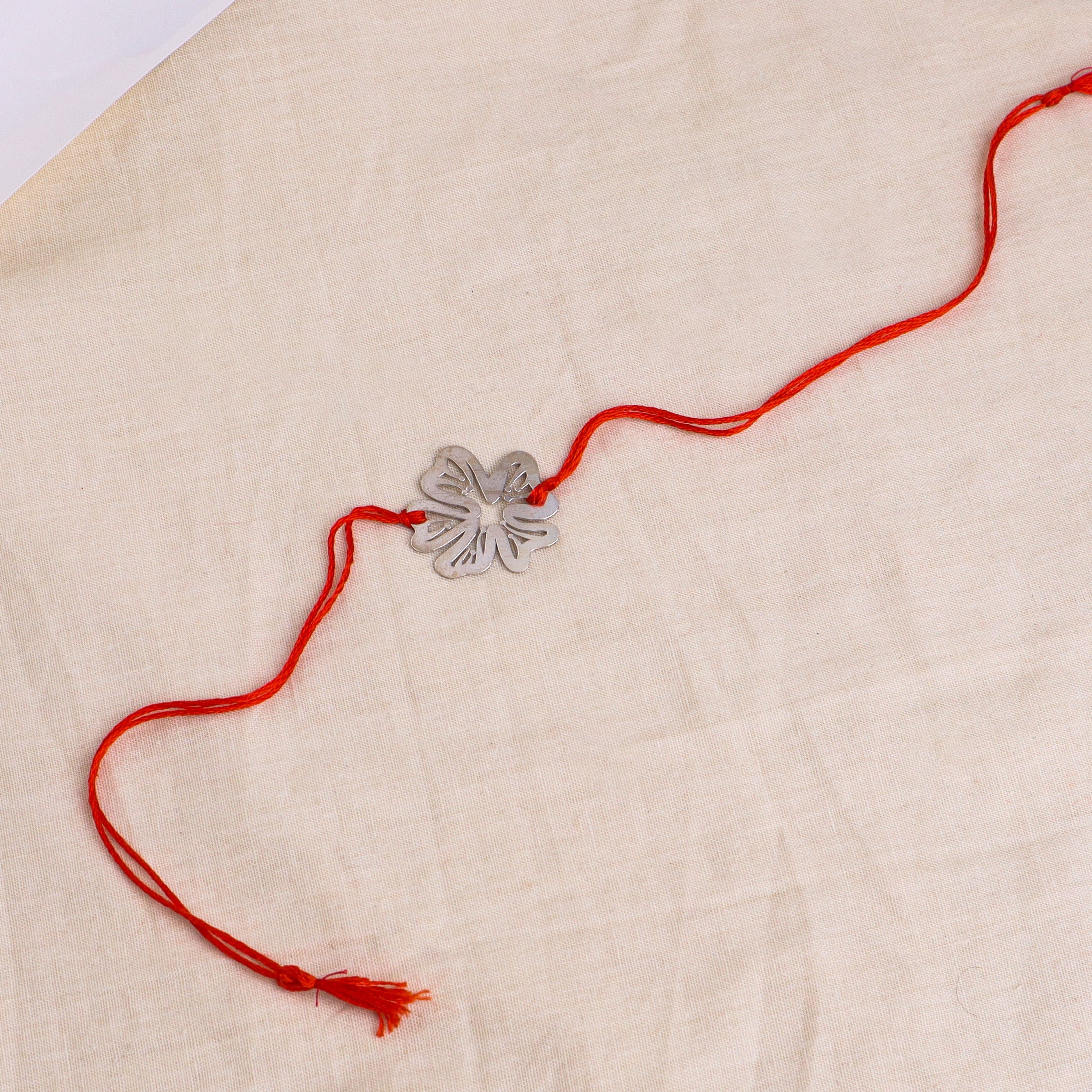 Silver Laser Cut Gulmohar Rakhi