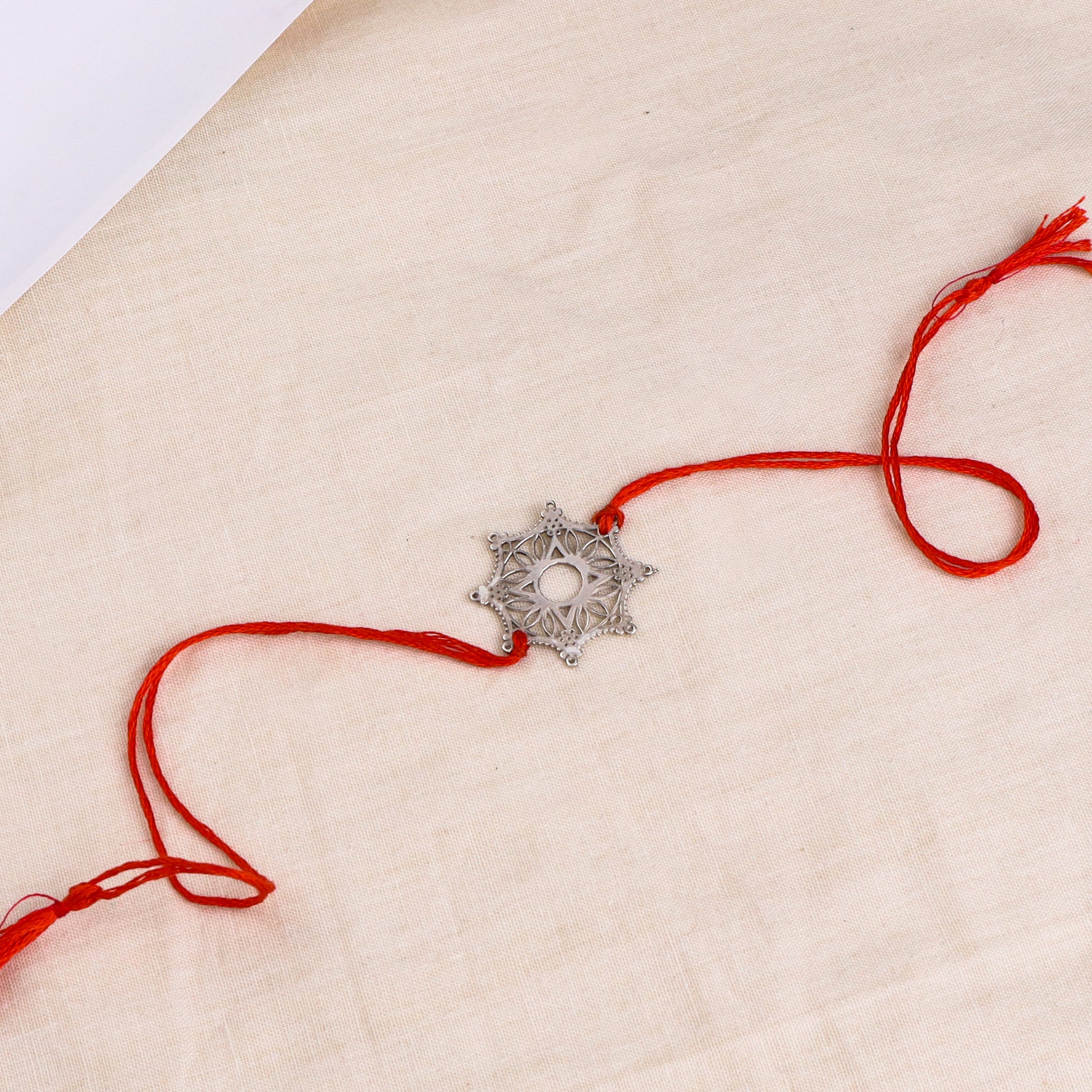 Silver Laser Cut Snowflake Rakhi