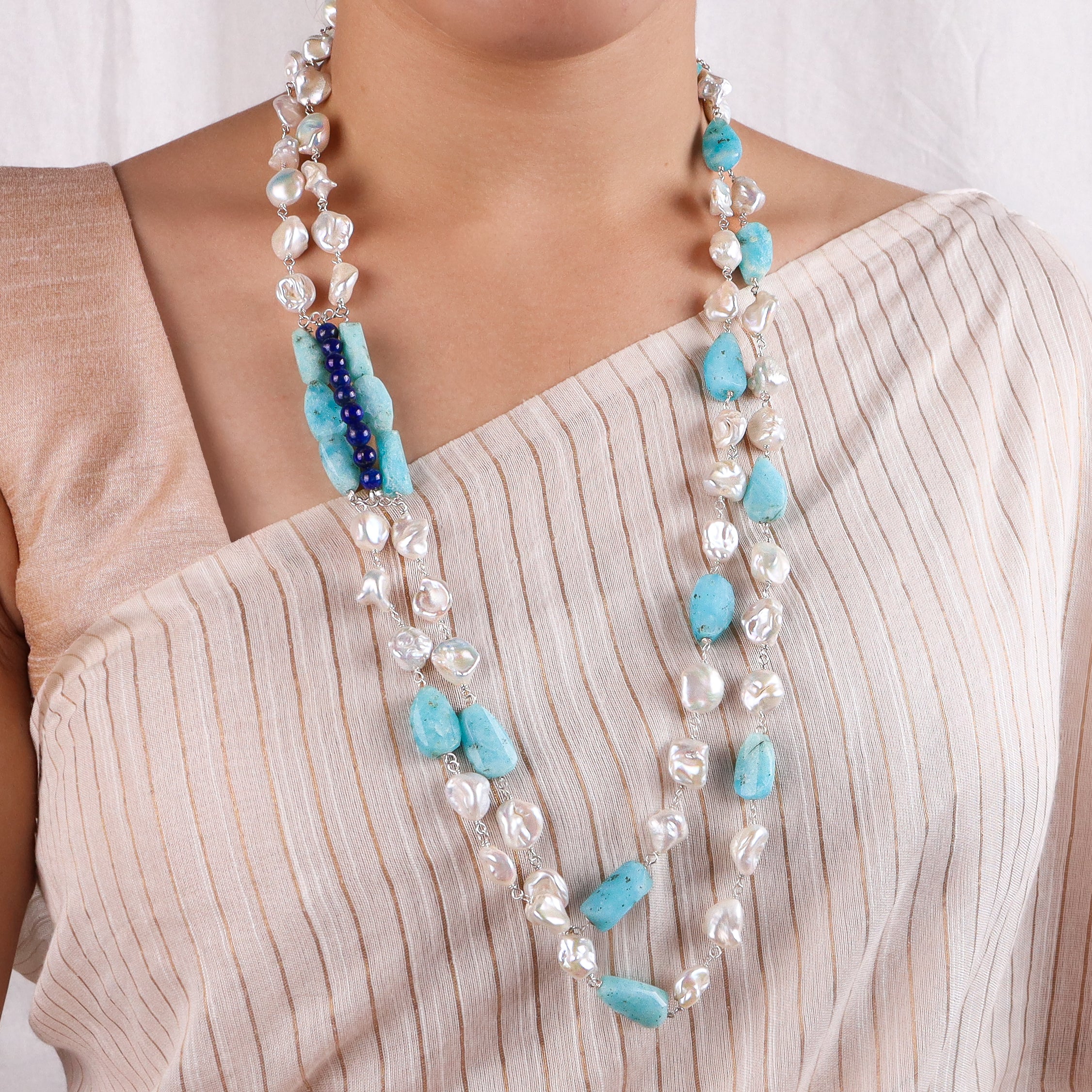 Lapis lazuli larimar pearl silver necklace close-up handcrafted detailing