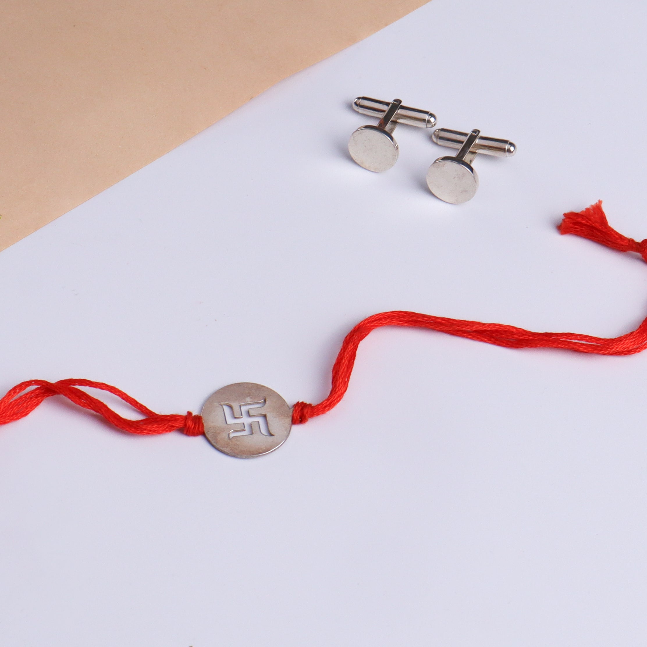 Silver Gift Set : Swastik Rakhi and Round Cufflink