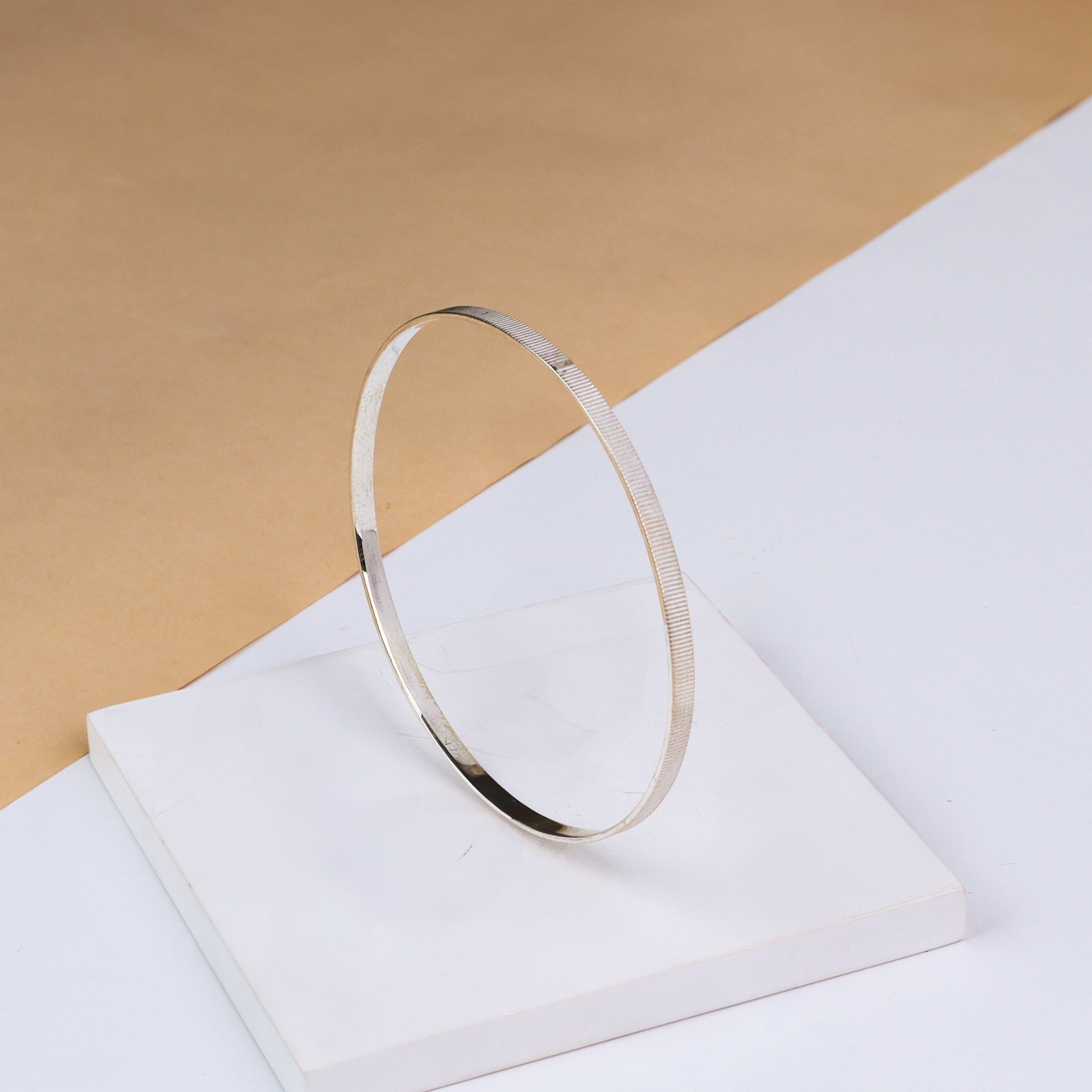 Silver linear textured bangle