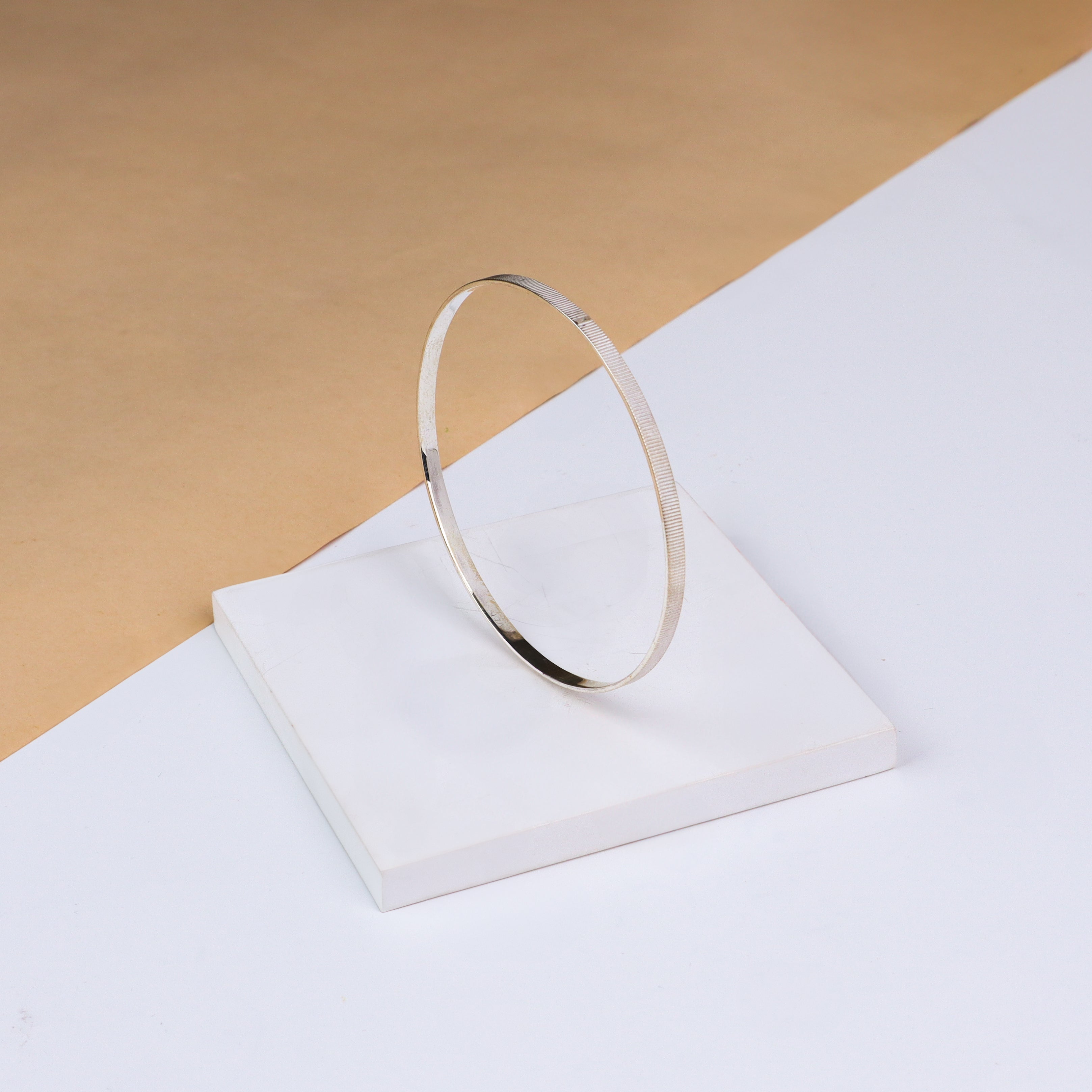 Silver linear textured bangle