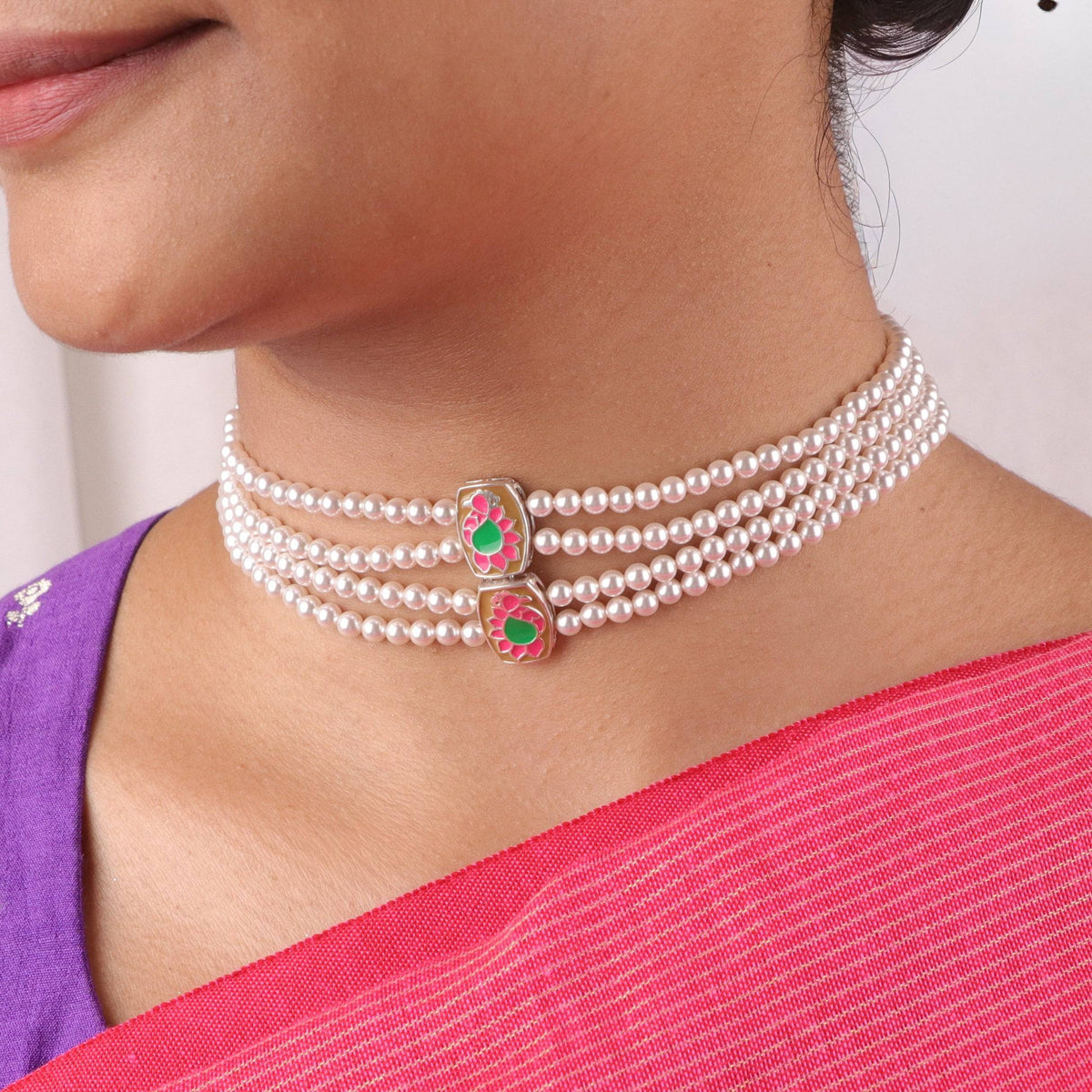 Close-up of Pearl Meena Pendant Choker with pink and green design