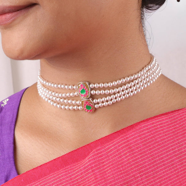Close-up of Pearl Meena Pendant Choker with pink and green design