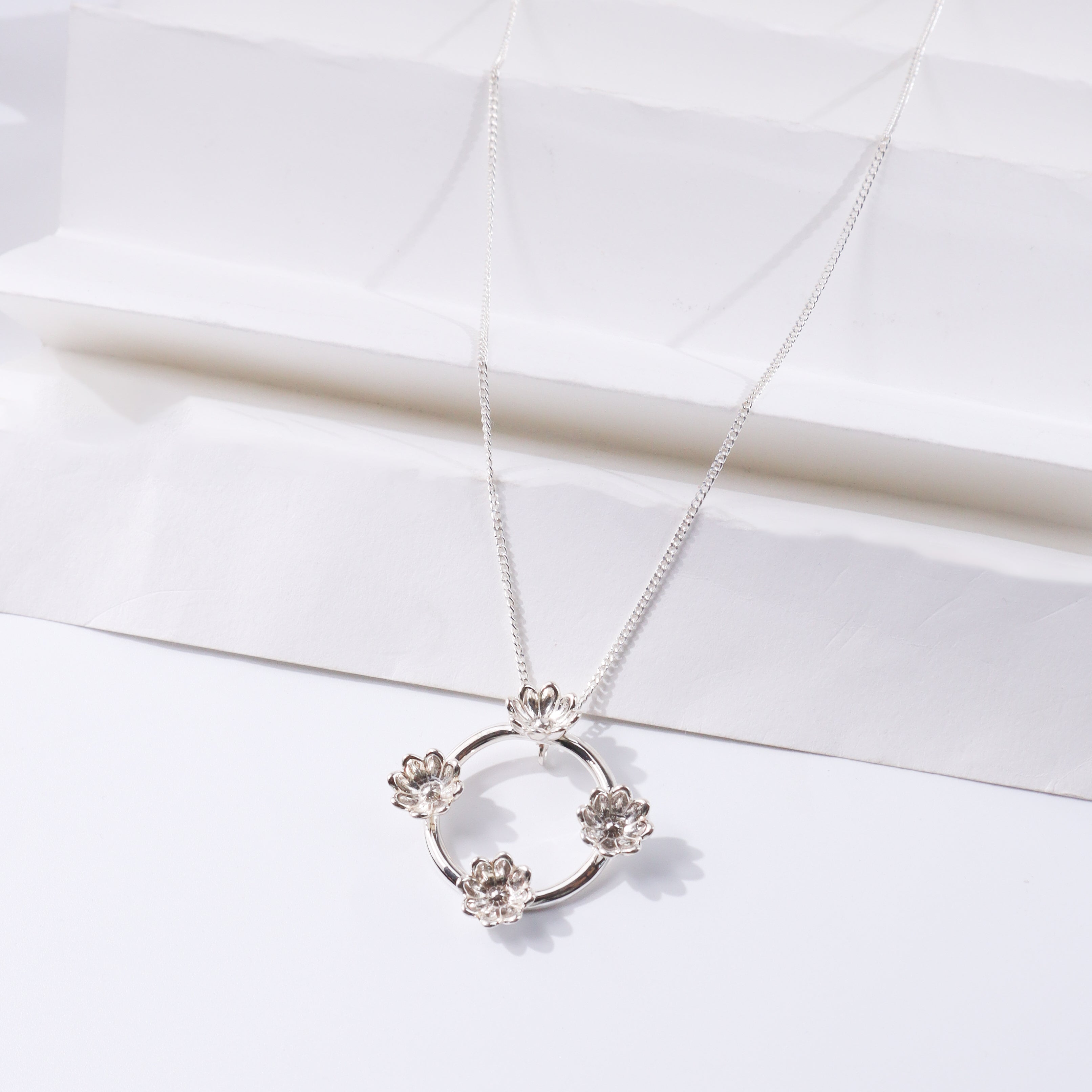 Four Flower Pendant Necklace