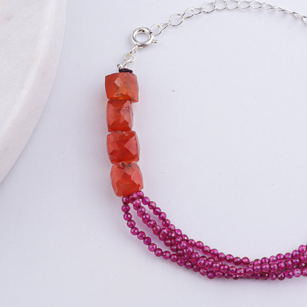 Close-up of Carnelian & Ruby Silver Bracelet showcasing natural carnelian, ruby stones, and intricate handmade craftsmanship
