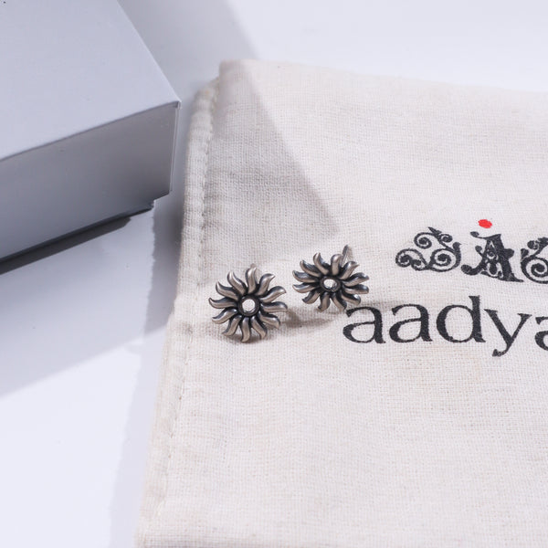 Silver Sun Motif Studs earrings with handcrafted silver design