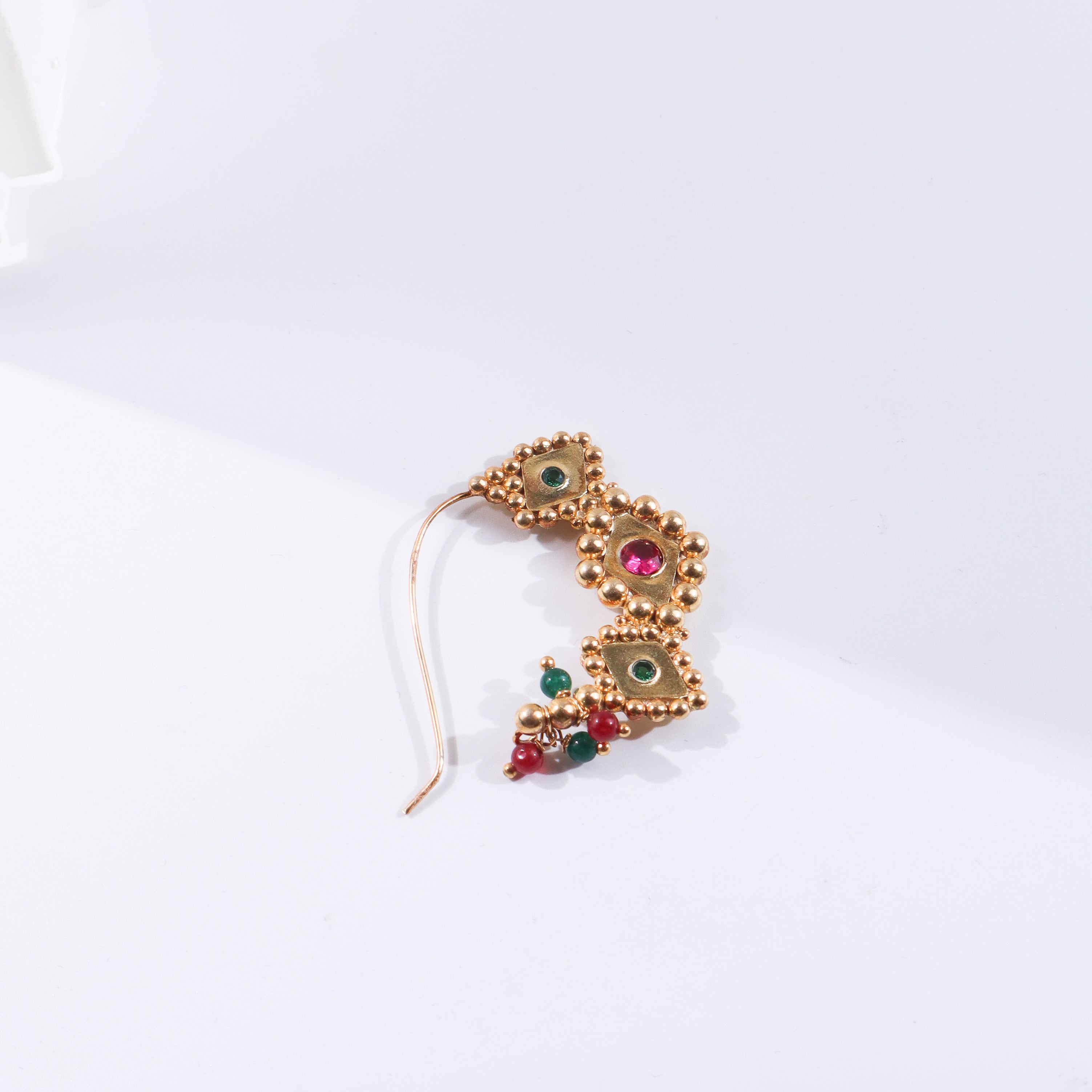 Gold and green gemstone nose ring