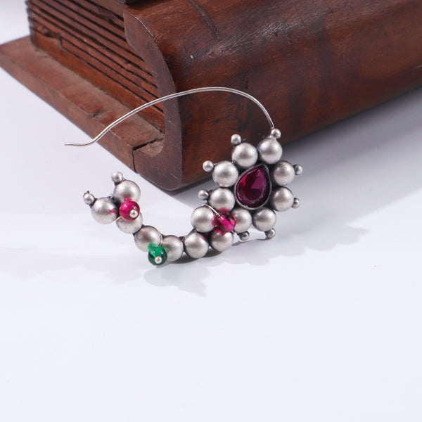 Silver jewelry with pink and green beads