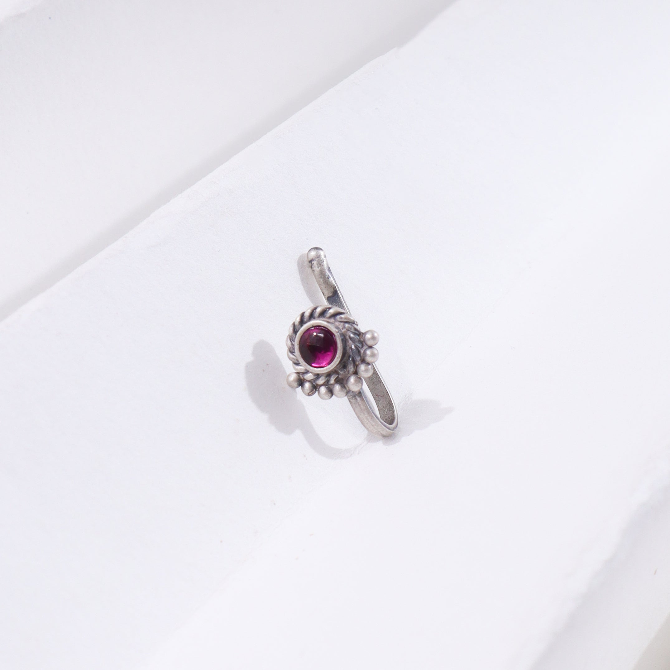 Silver Chandrika Nosepin with purple gemstone