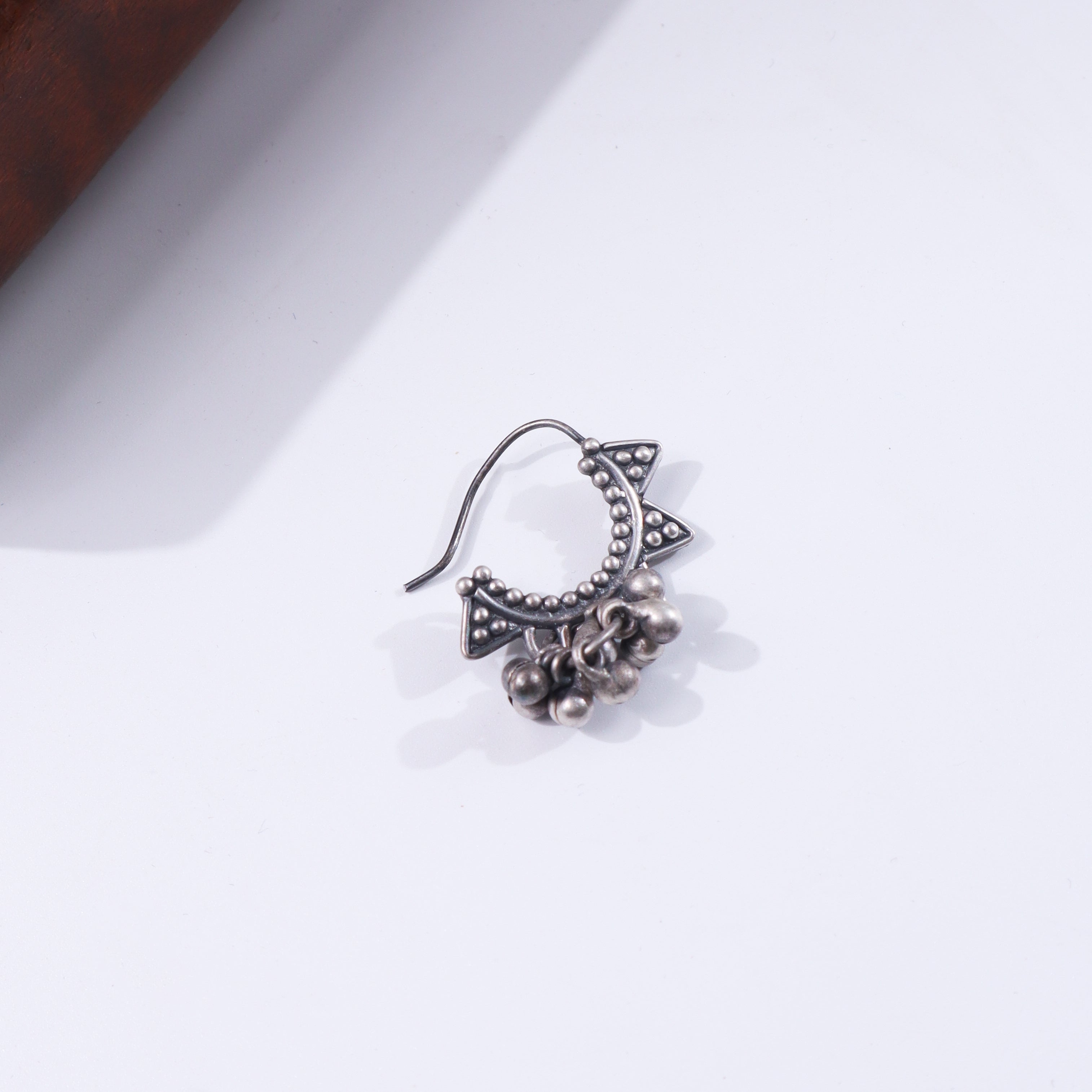Silver jewelry with beads and floral design