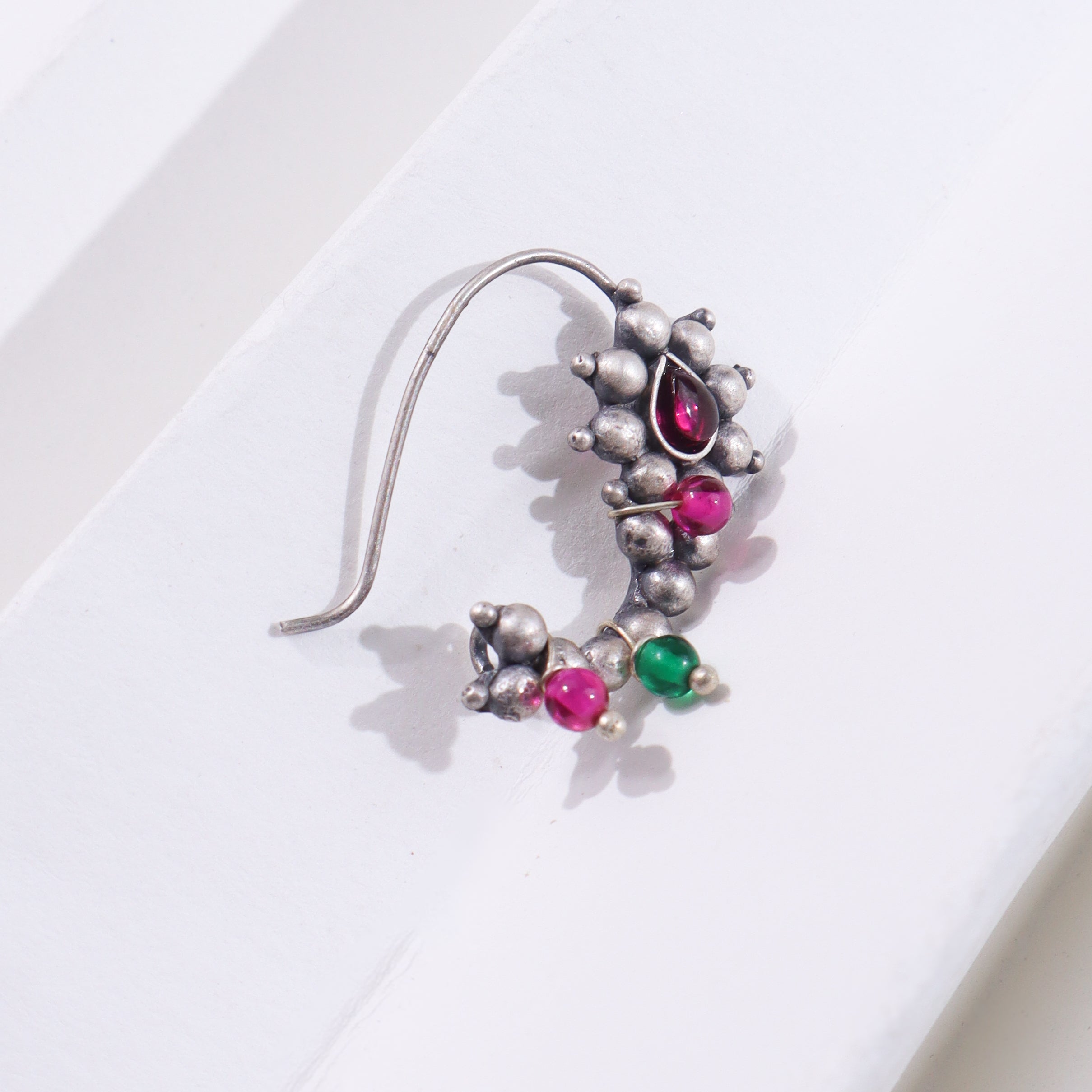 Silver jewelry with pink and green beads