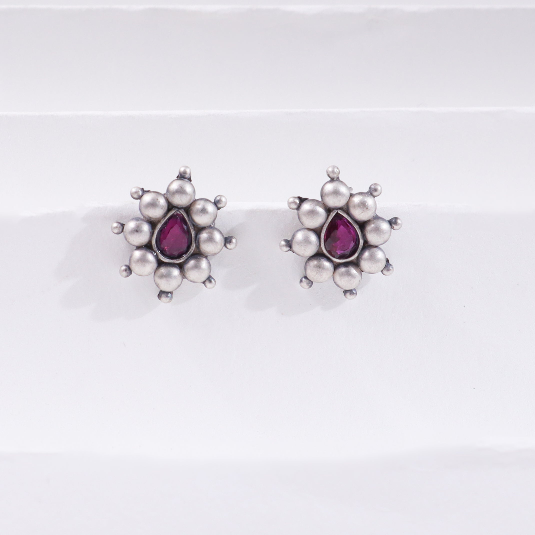 Silver drop earrings with pink gemstone