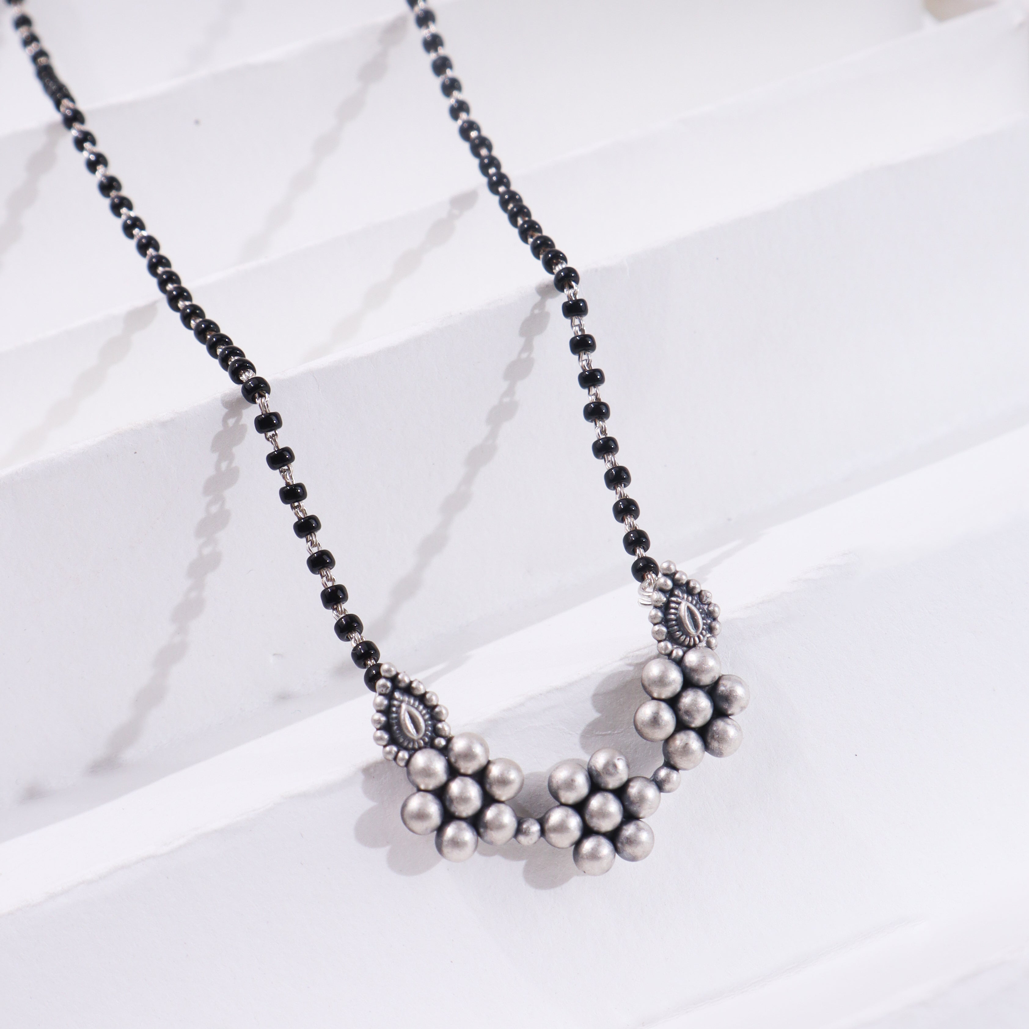 Silver Kudi Nath Mangalsutra with black beads and pendant