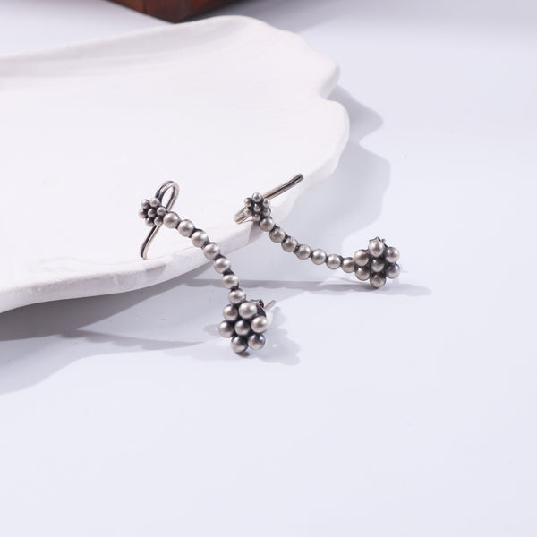 Sterling silver earrings with traditional floral design
