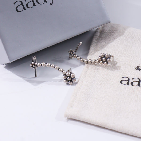 Sterling silver earrings with traditional bead design