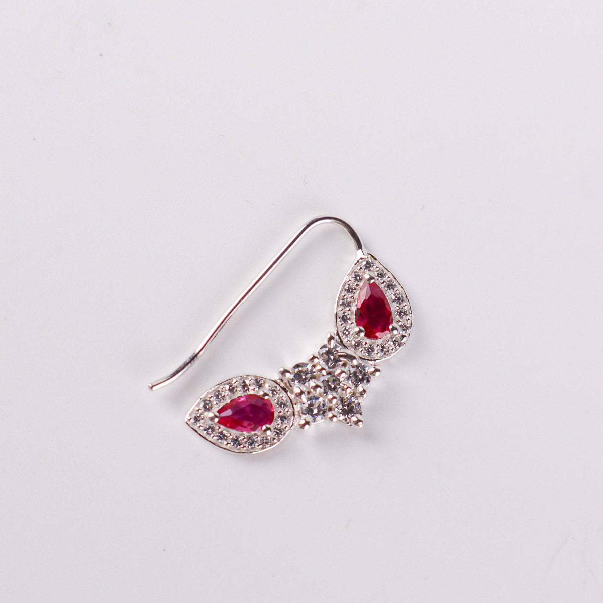 Silver flower pink drop nath with cz stones pierced small on white background