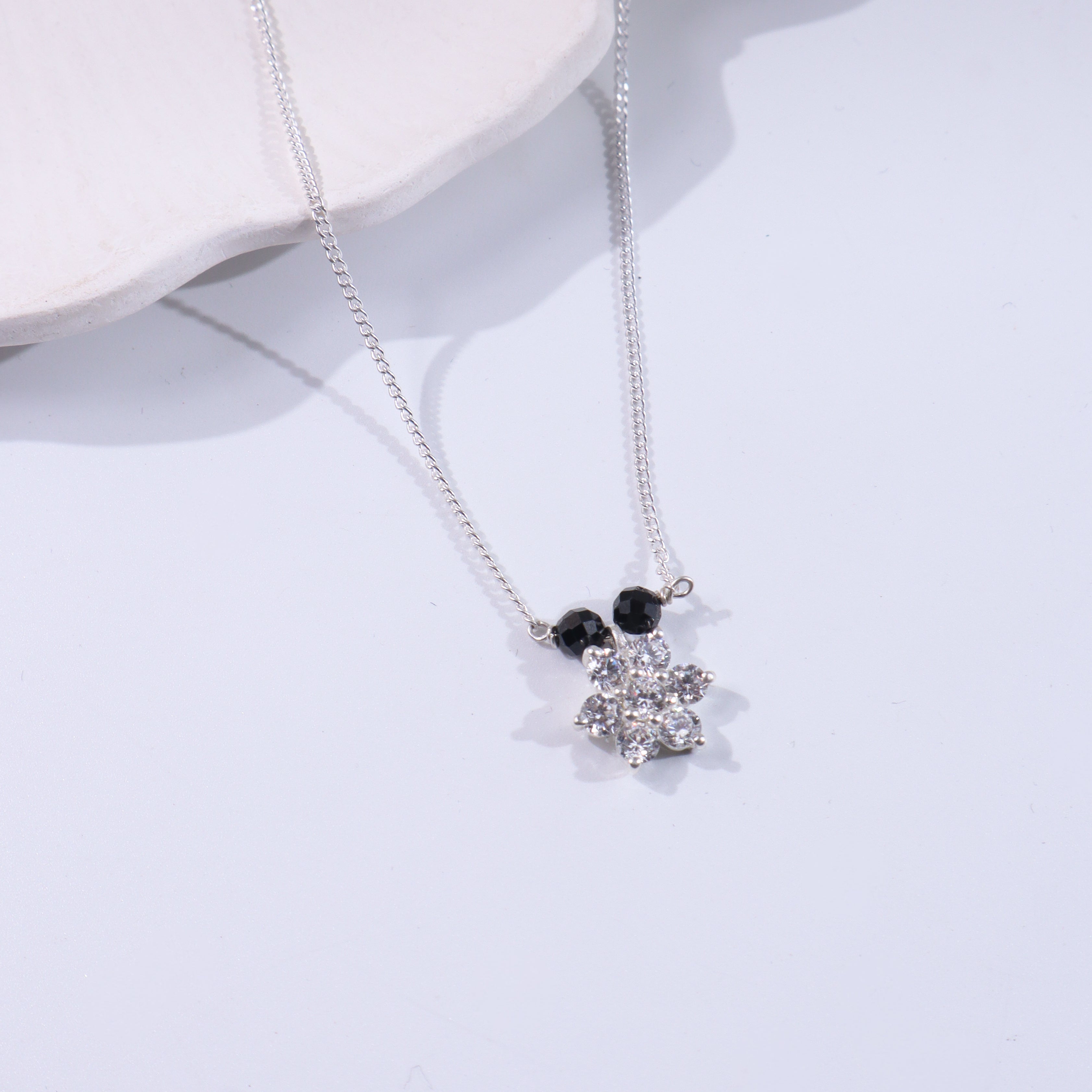 Silver chain with black and clear crystal beads
