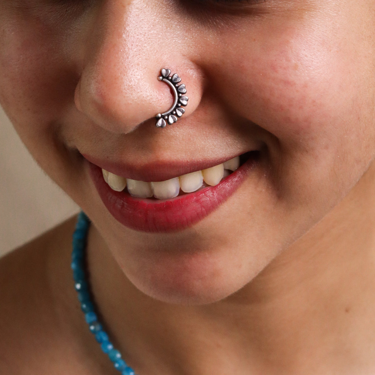 heart motif detailing on silver nath