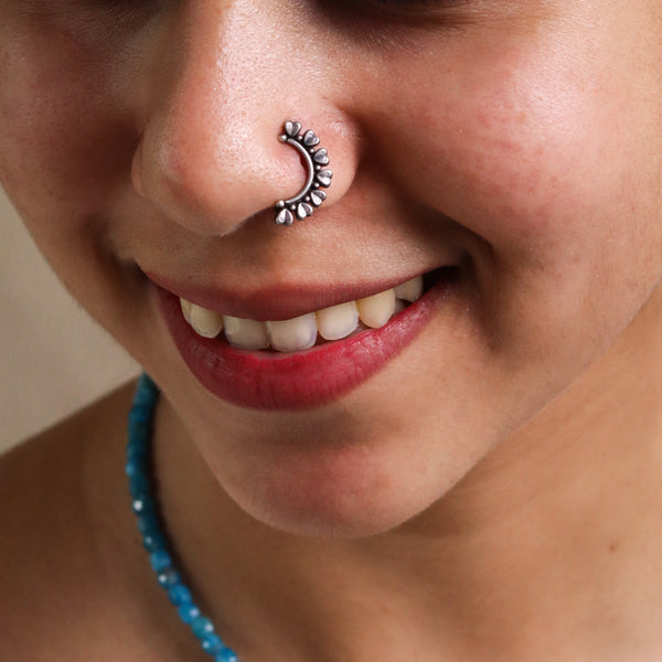 heart motif detailing on silver nath