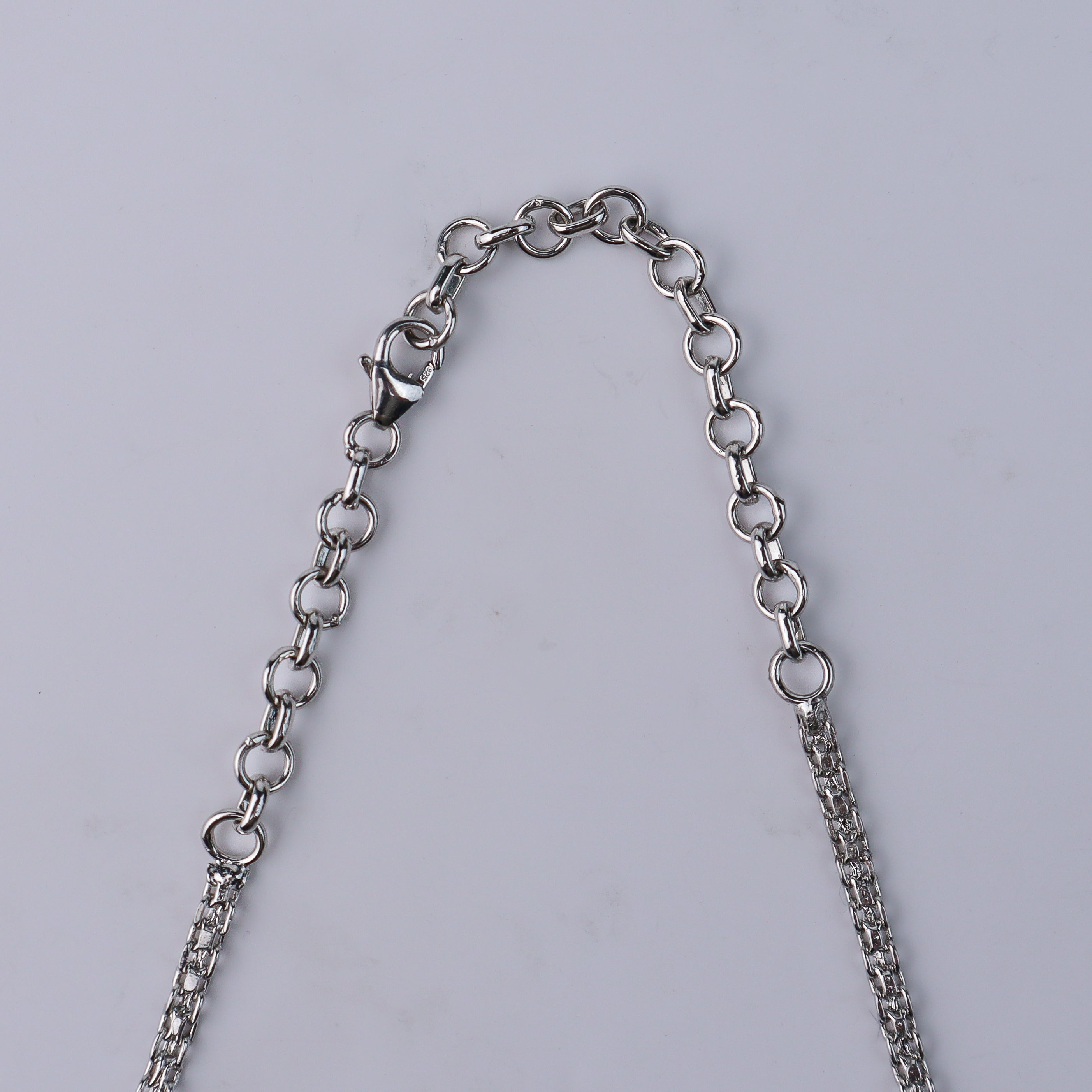 Silver chain with cubic zirconia pendant and matching earrings