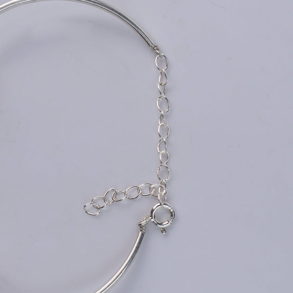 Back view of silver pearl bracelet with adjustable chain