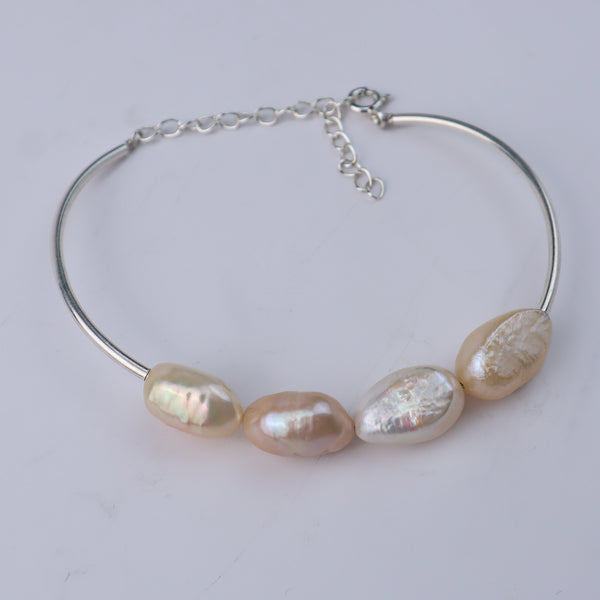 Silver bracelet with freshwater pearls and chain