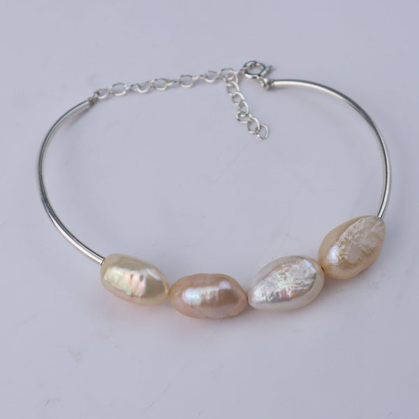 Silver bracelet with freshwater pearls and chain