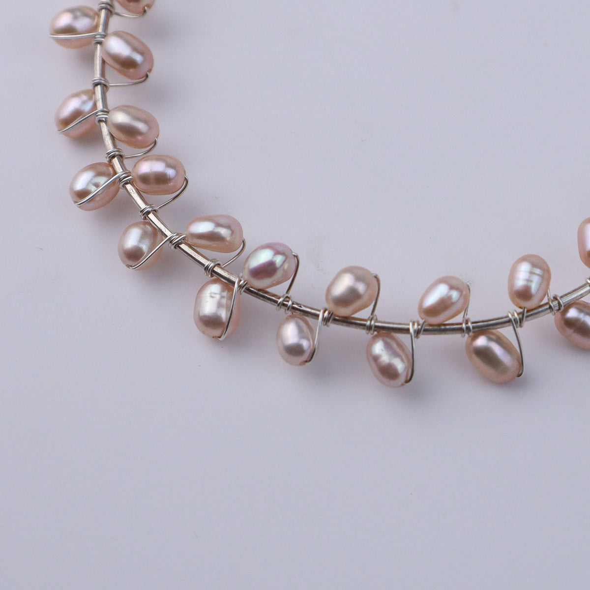 Pearl bracelet detail, rice pearls, silver clasp, jewelry close-up