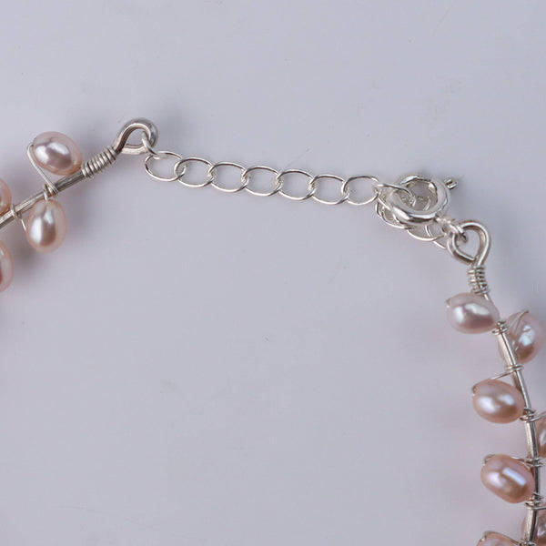 Pearl bracelet clasp, silver chain, jewelry accessory, close-up
