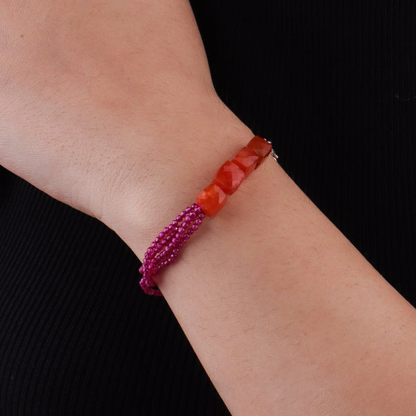 Model wearing Carnelian & Ruby Silver Bracelet in 92.5 sterling silver for an elegant handcrafted jewellery look